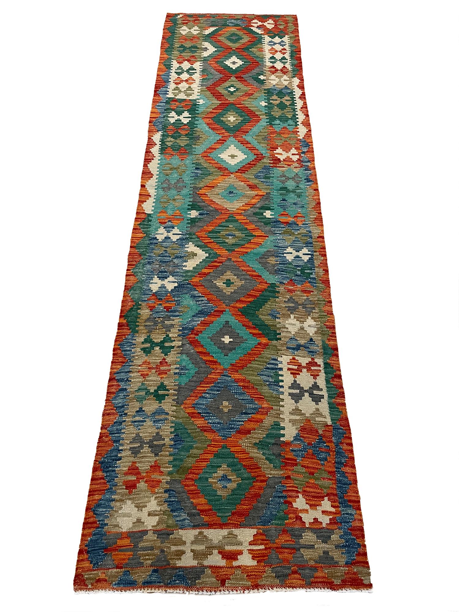 Fantastic quality, reversible, all wool with vegetable dyes. Measures: 2′ 6″ x 9′ 7″.

Kilim, a word of Turkish origin, denotes a textile of many uses produced by one of several flatweaving techniques. They have a common or closely related
