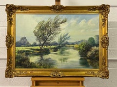 Pintura al óleo de un paisaje lacustre fluvial arbolado en la campiña irlandesa