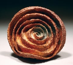 "Bent Spiral", textured ceramic in reddish browns