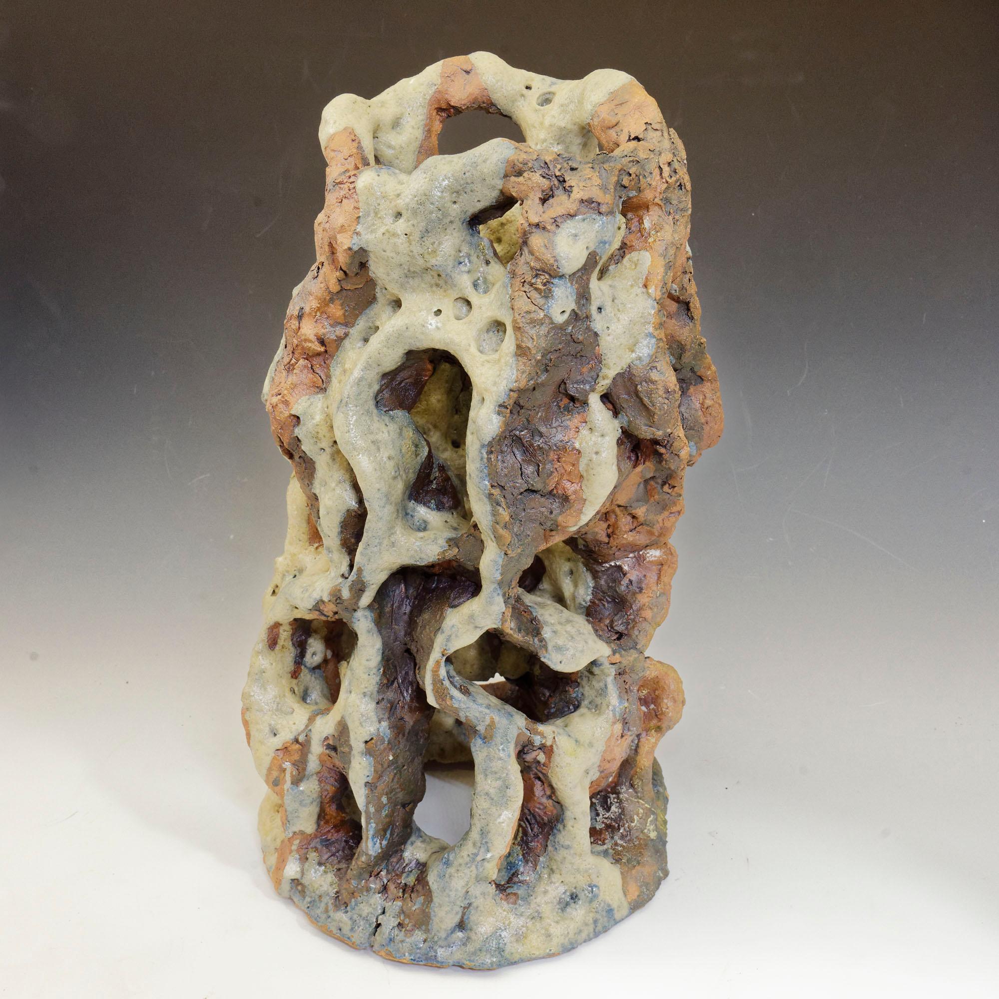 "Eroded Tower, " celadon green colored textured ceramic, embodies essential clay - Sculpture by Allan Drossman