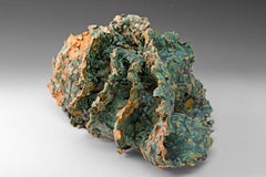 "Sea Creature 2", textured ceramic in blue greens, embodies essential clay