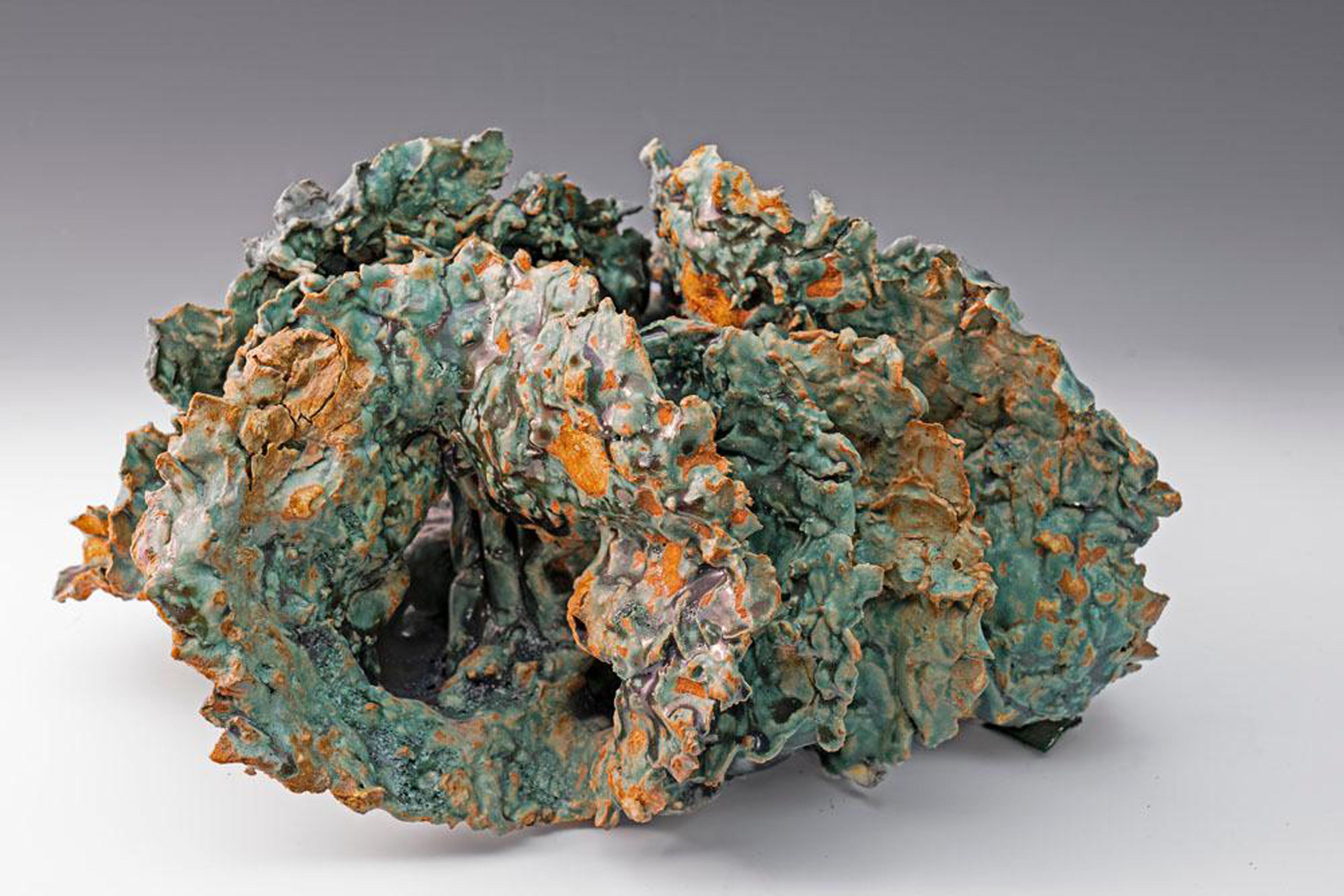 
Sea Creature 2, textured ceramic in blue greens, embodies the essence of clay in its organic shapes that refer directly to the earth and nature. The artist says 
