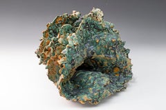 "Sea Creature 2", textured ceramic in blue greens, embodies essential clay