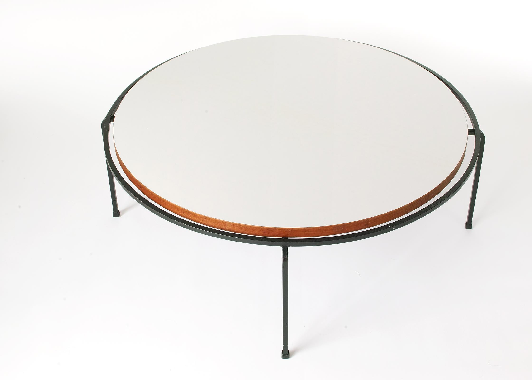 Circular coffee table with original inset white laminate top and square tube steel base with black painted finish. This is a rarely seen design by Allan Gould in the larger diameter size. The 36