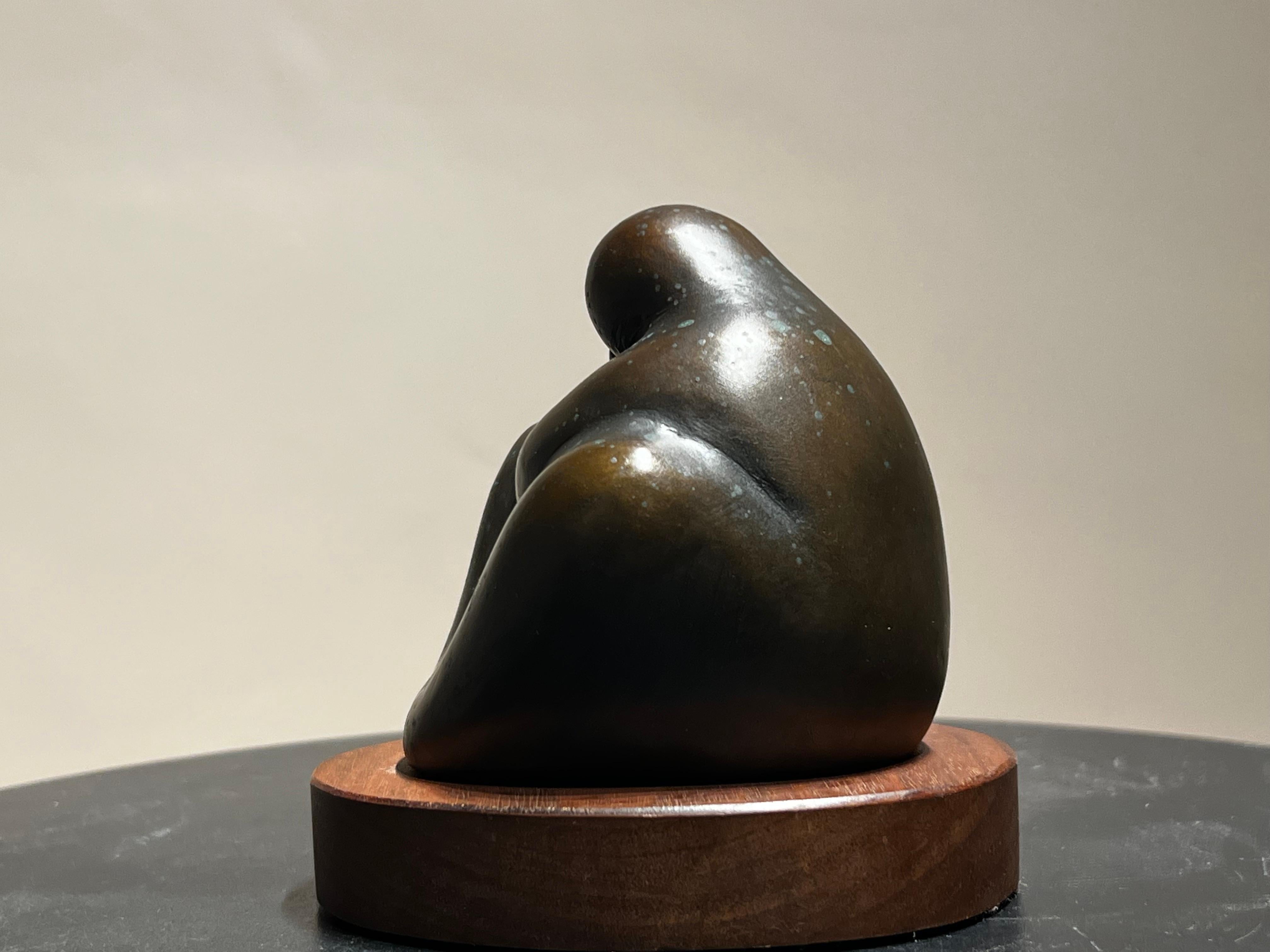 Motherhood sculpture by Allan Houser, mother, child, abstract, bronze, small 
limited edition
small nick in wood base