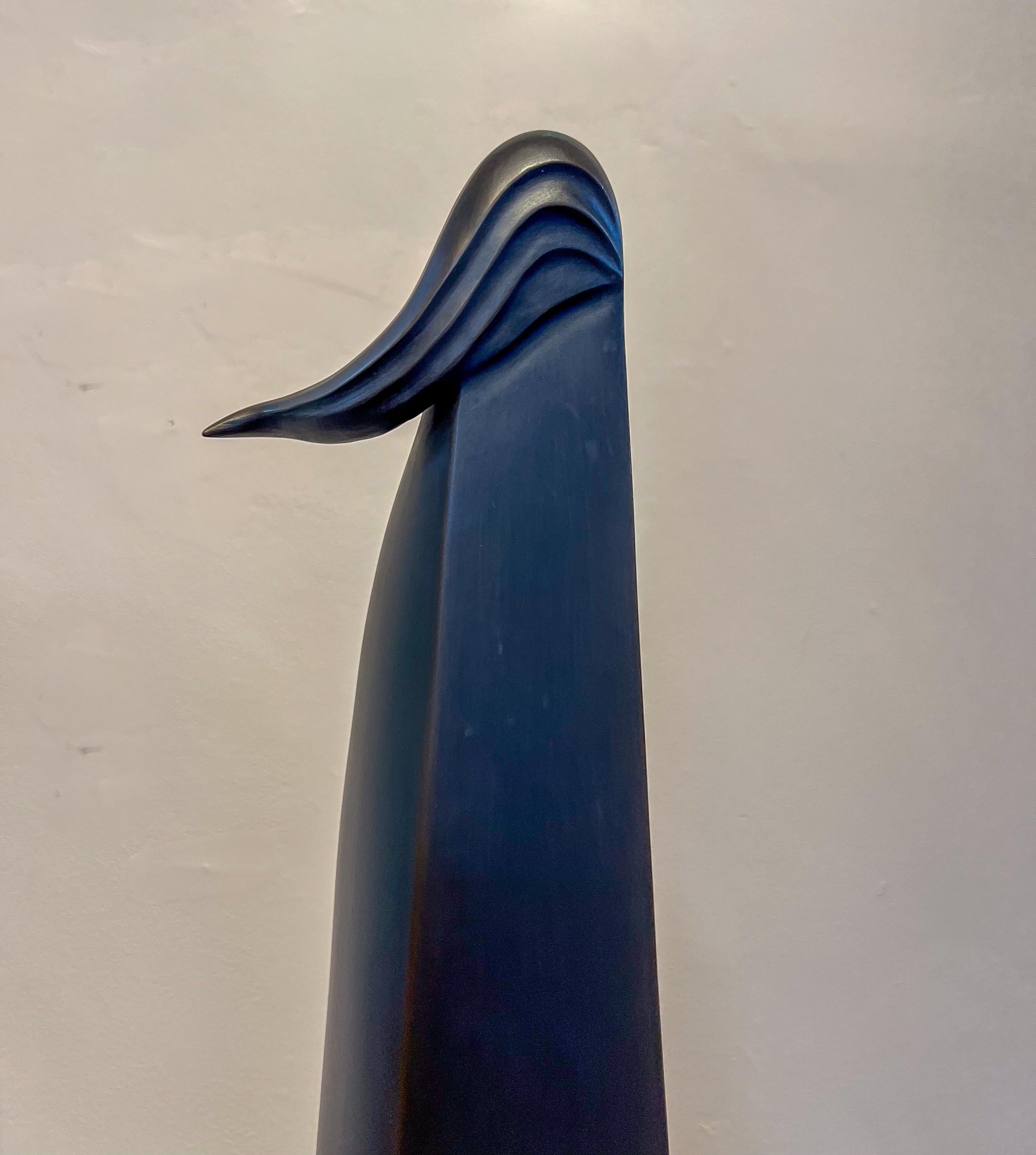 Wind on the Mesa, sculpture by Allan Houser, angular, bronze, woman, female 3