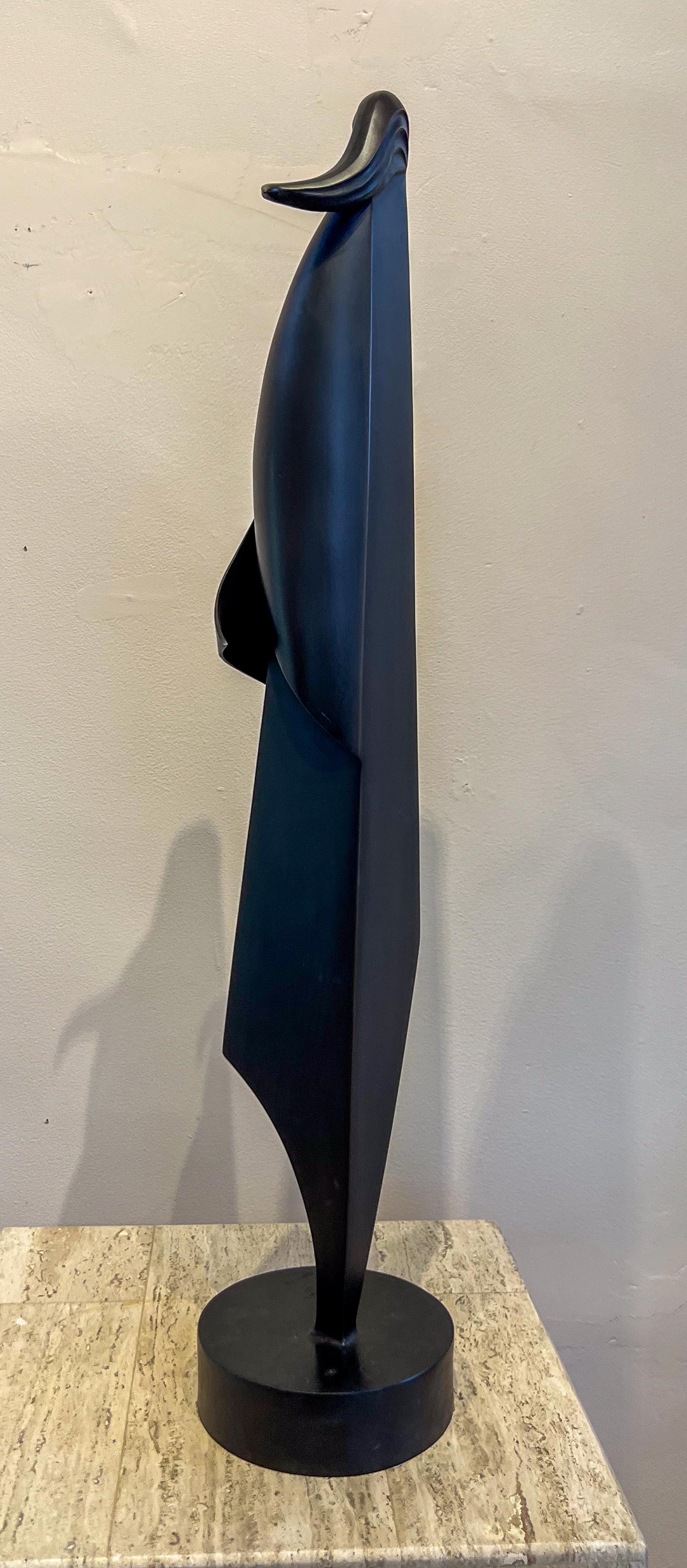 Wind on the Mesa, sculpture by Allan Houser, angular, bronze, woman, female 4