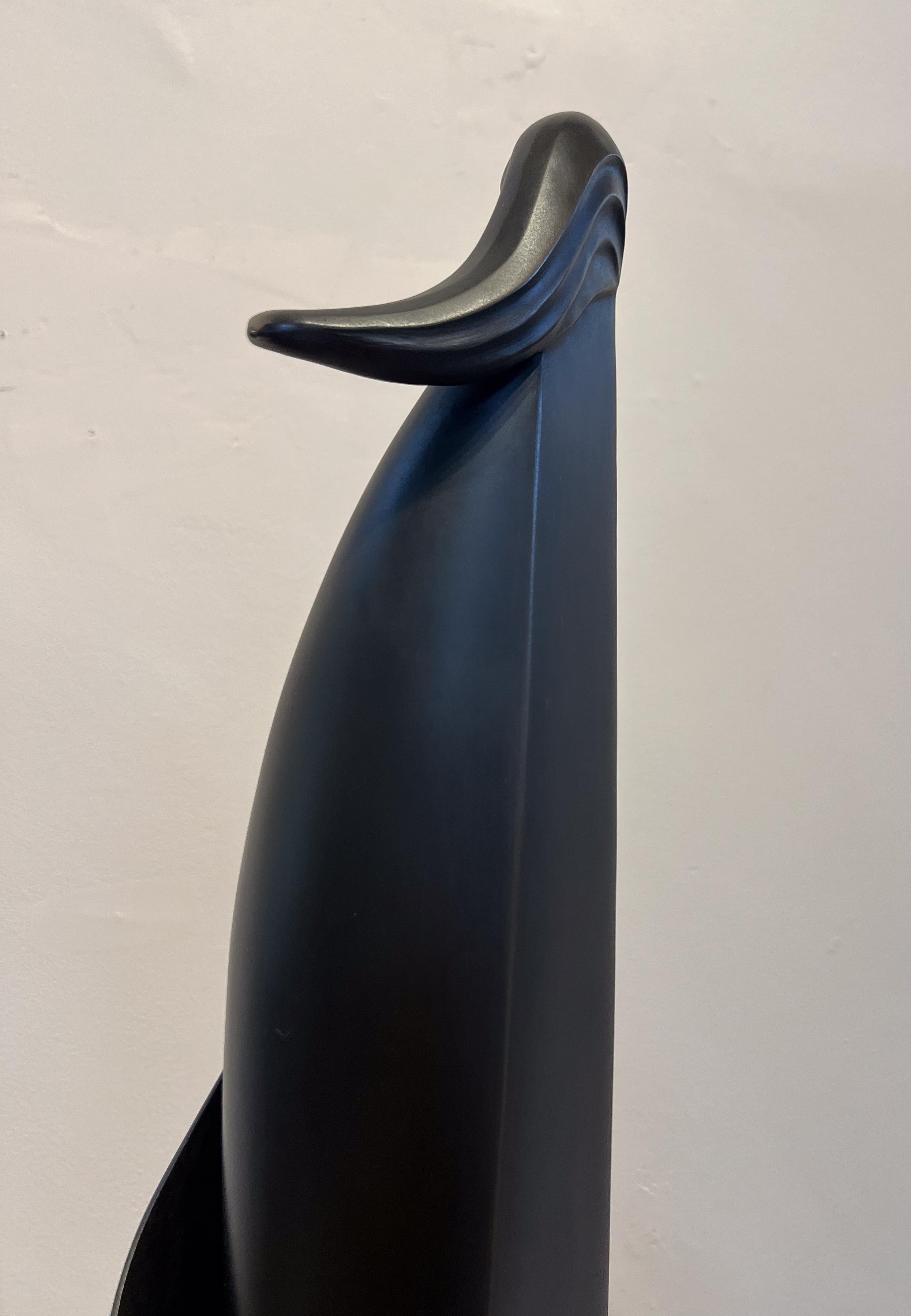 Wind on the Mesa, sculpture by Allan Houser, angular, bronze, woman, female 5