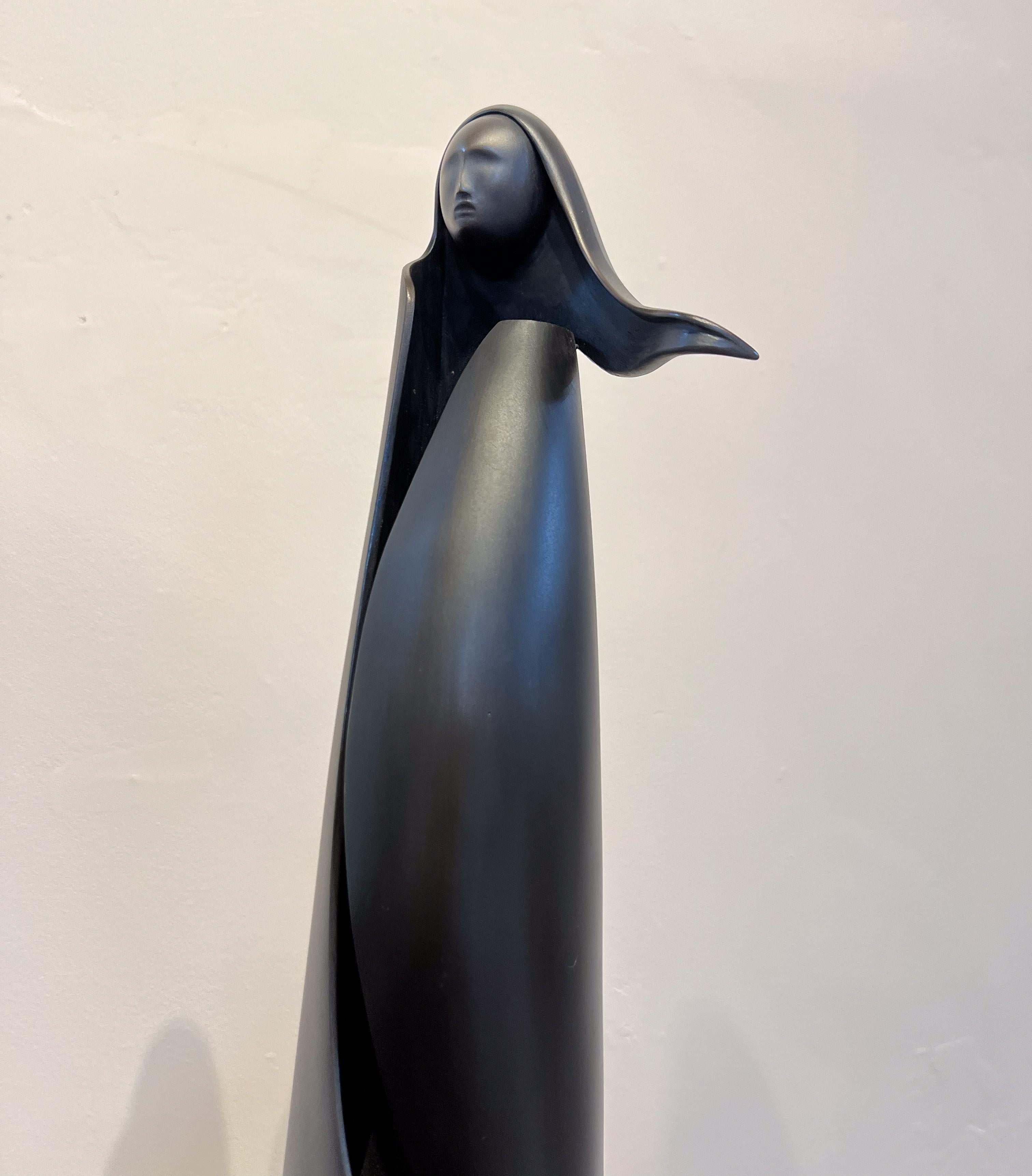 Wind on the Mesa, sculpture by Allan Houser, angular, bronze, woman, female 7