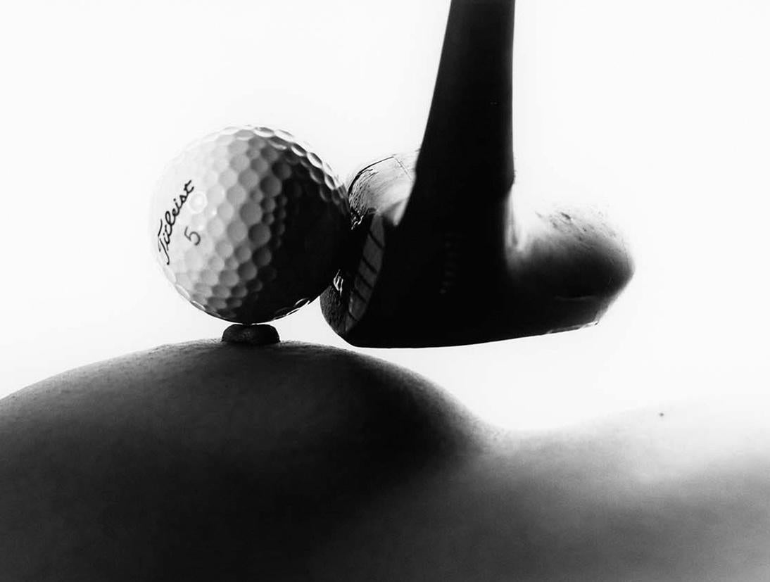 Teeing - black and white photography - Photograph by Allan I. Teger