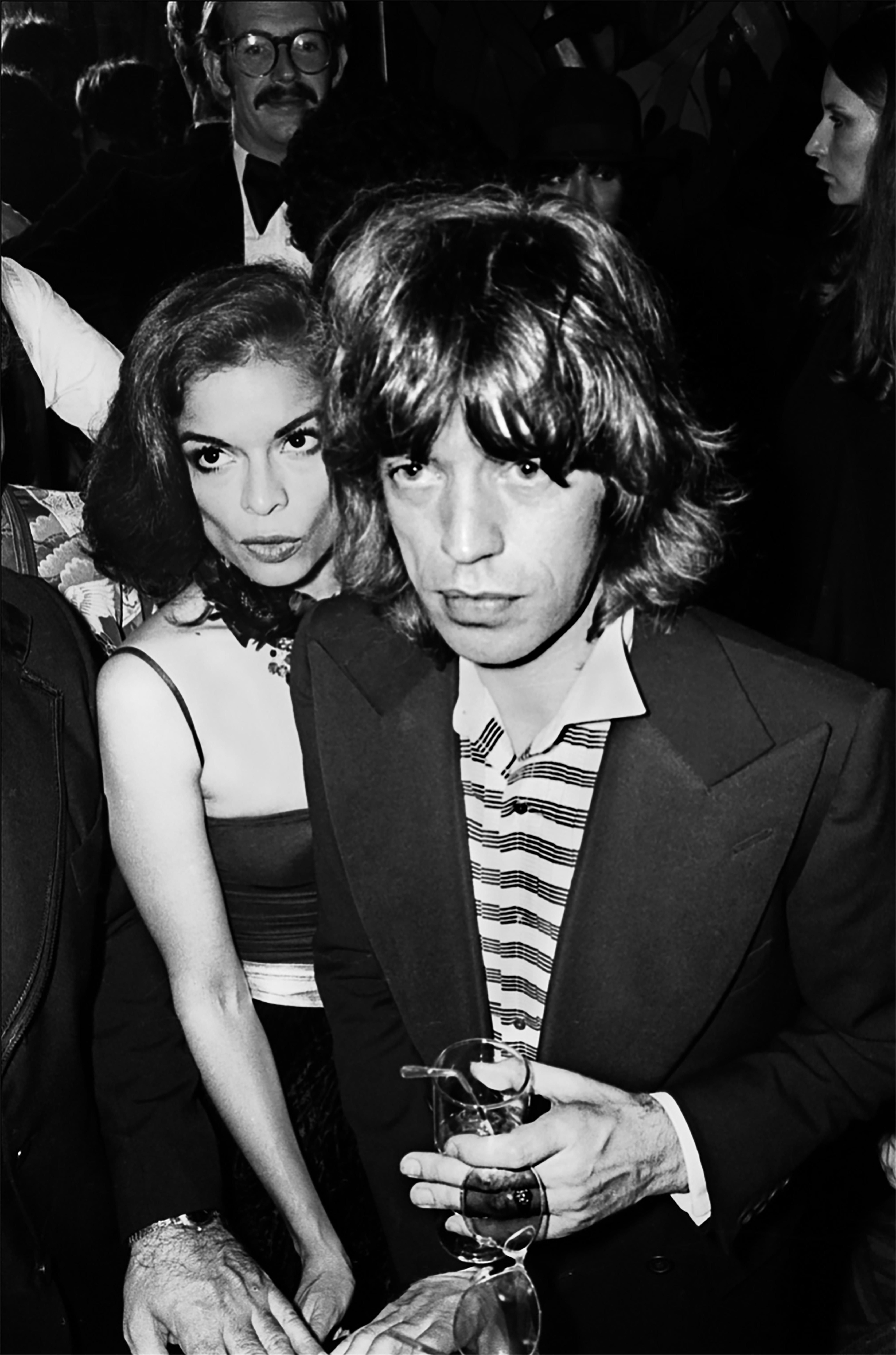 Allan Tannenbaum Portrait Photograph - Mick & Bianca Jagger At The Copacabana, 1976