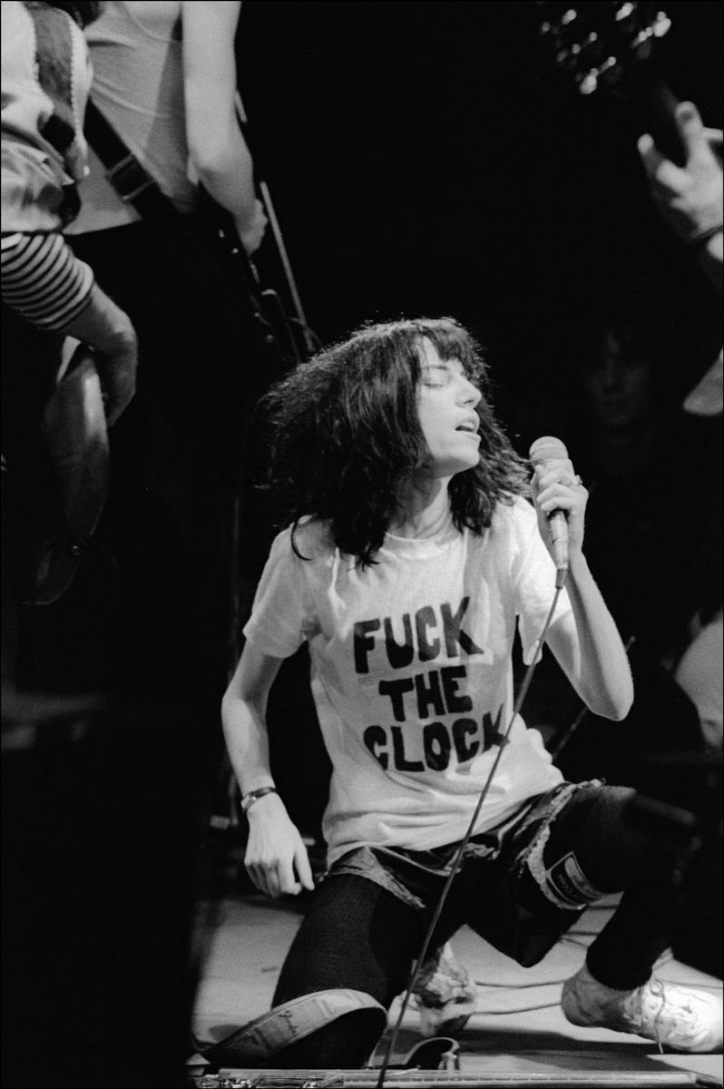 AVAILABLE FOR IMMEDIATE SHIPPING

Signed limited edition archival print of Patti Smith wearing her “Fuck The Clock” t-shirt by Allan Tannenbaum, taken at CBGB in New York, New Years Eve 1977.  

20x24" print, limited edition number 9/25