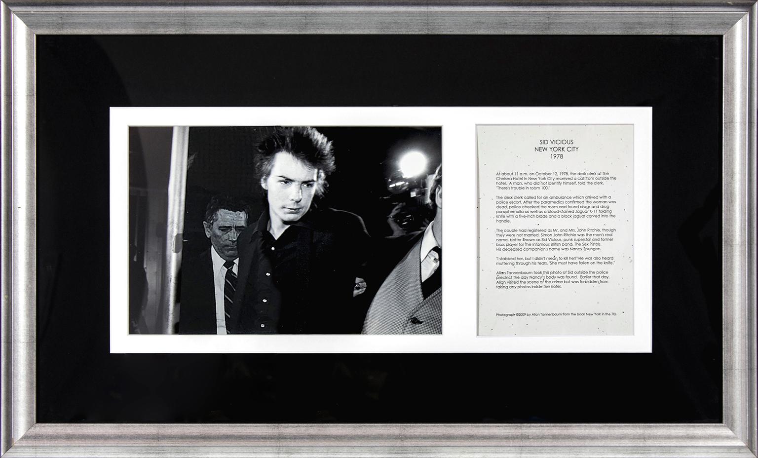 "Sid Vicious Arrest" black and white photograph by Allan Tannenbaum. Image size: 9 x 13 inches. The text to the right of the photo reads: "Sid Vicious New York City 1978. At about 11 a.m. on October 12, 1978, the desk clerk at the Chelsea Hotel in