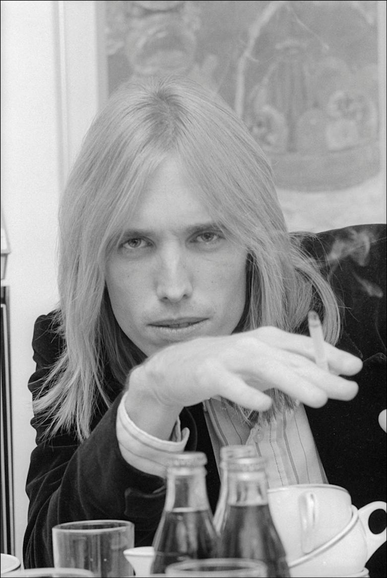 Allan Tannenbaum Black and White Photograph - Tom Petty In his Hotel Room in NYC 1977