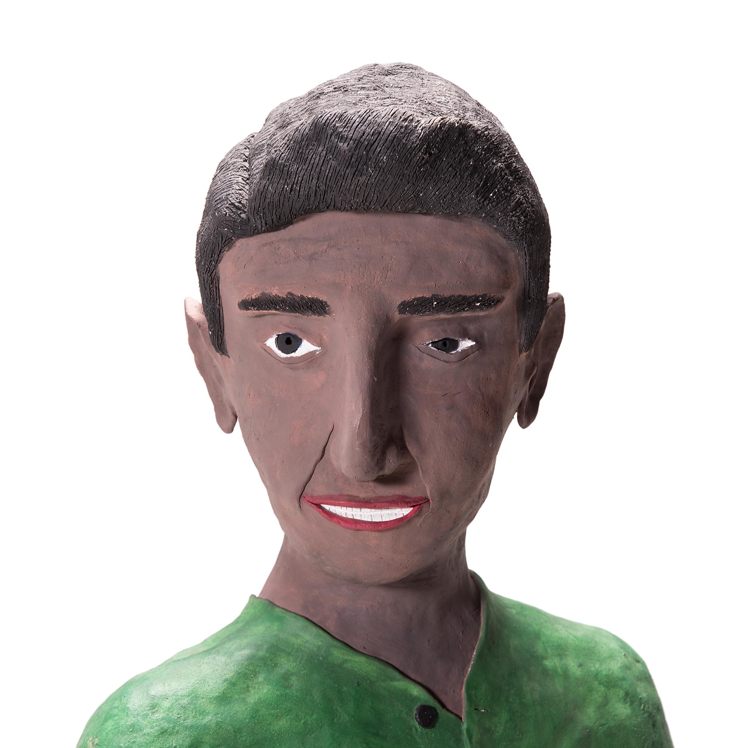 „Man in Green Shirt“, Acryl auf Keramik (Surrealismus), Sculpture, von Allan Winkler