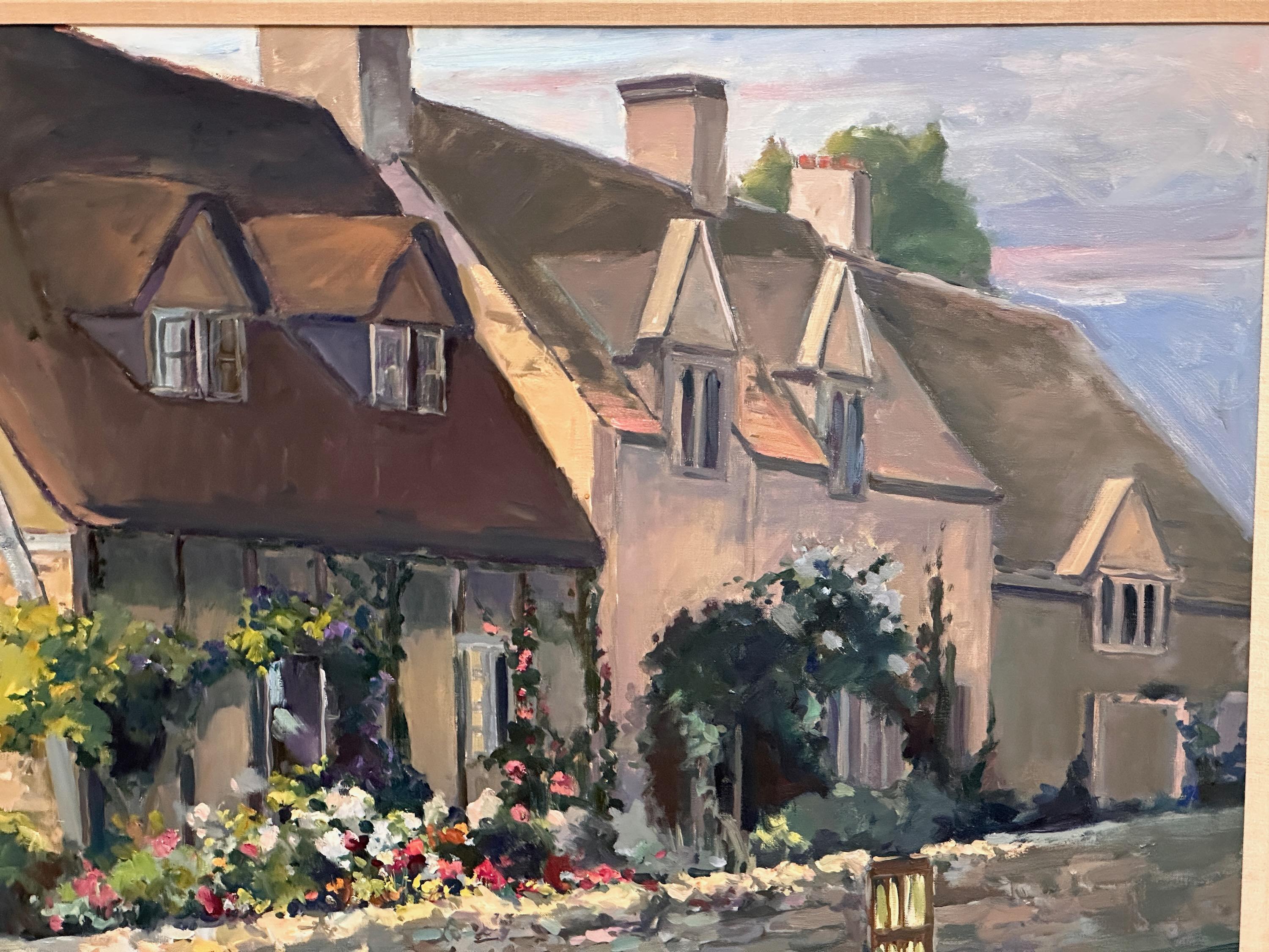 A large oil on canvas painting of a Cotswold cottage by noted Laguna Beach artist, Allayn Stevens in handsome black and gilt frame.