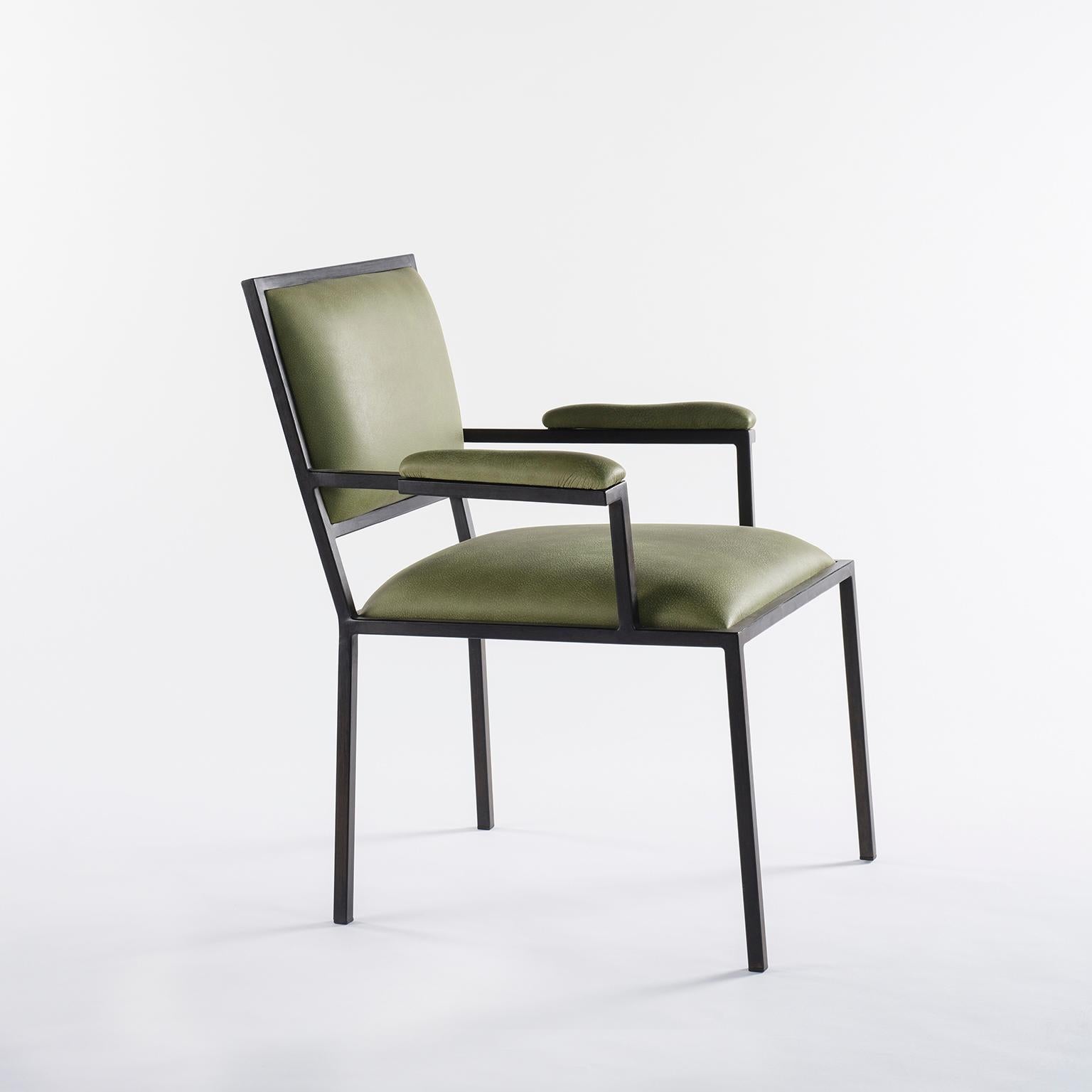 Designed for Alle Scuderie restaurant, a leathered upholstered armchair, in a simple linear frame.
This light-weight design comes in a wide range of Italian leathers and it combines very well with classic and modern interiors.