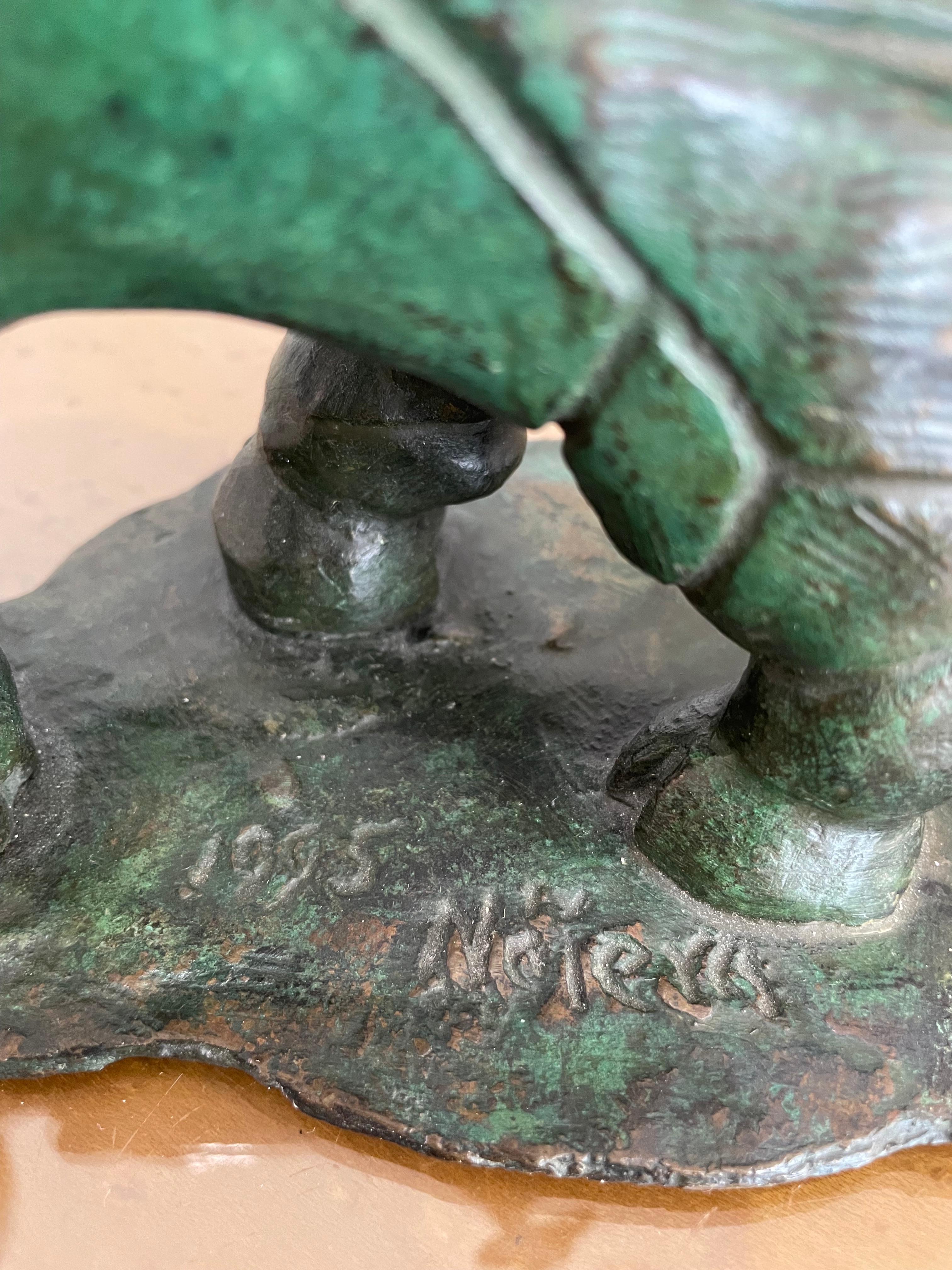 The artist of this bronze sculpture would seem to have taken their inspiration from a painting by the American artist Purvis Young (Many of Young's pieces depict angels on horseback).

Note: The piece is signed and dated on the base.

Note: We