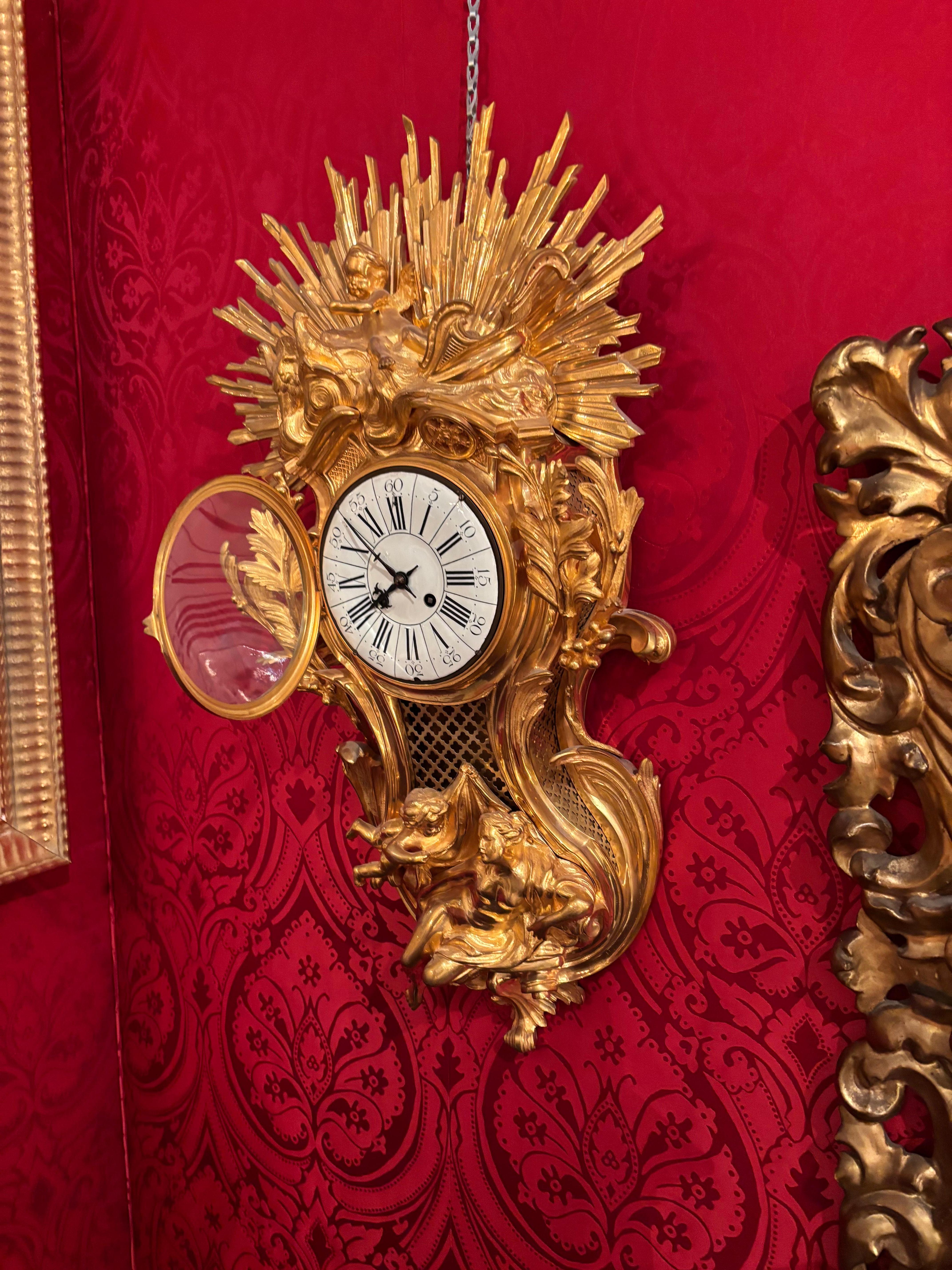 Allegorical Louis XV Style Gilt Bronze Cartel Clock Depicting 