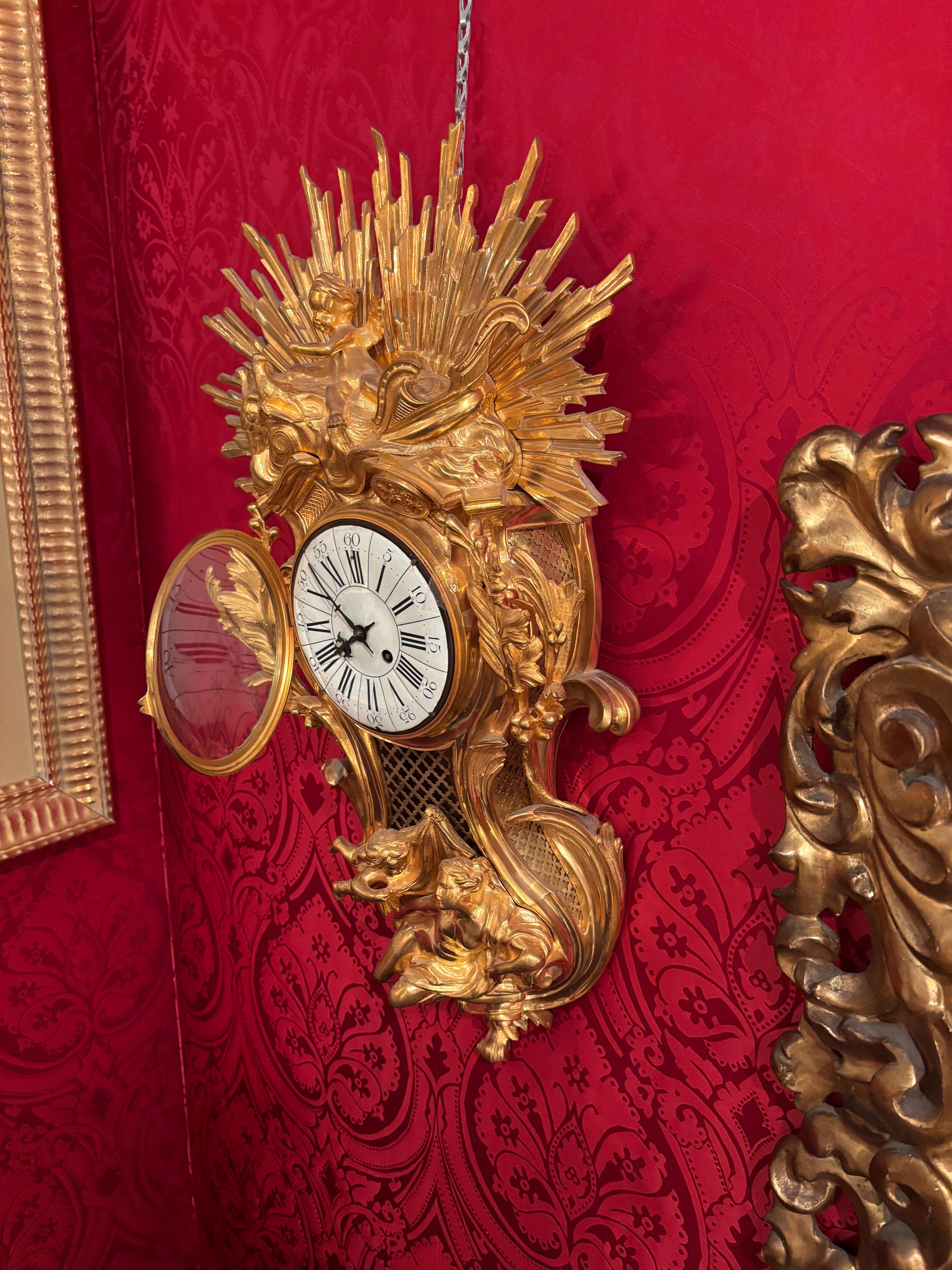 Allegorical Louis XV Style Gilt Bronze Cartel Clock Depicting 