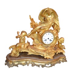 Allegorical Rococo Revival Clock Depicting a Gilt Water Sprite with Putti