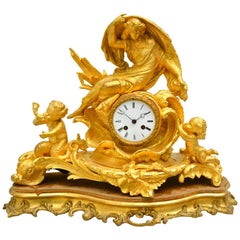 Antique Allegorical Rococo Revival Clock Depicting a Gilt Water Sprite with Putti