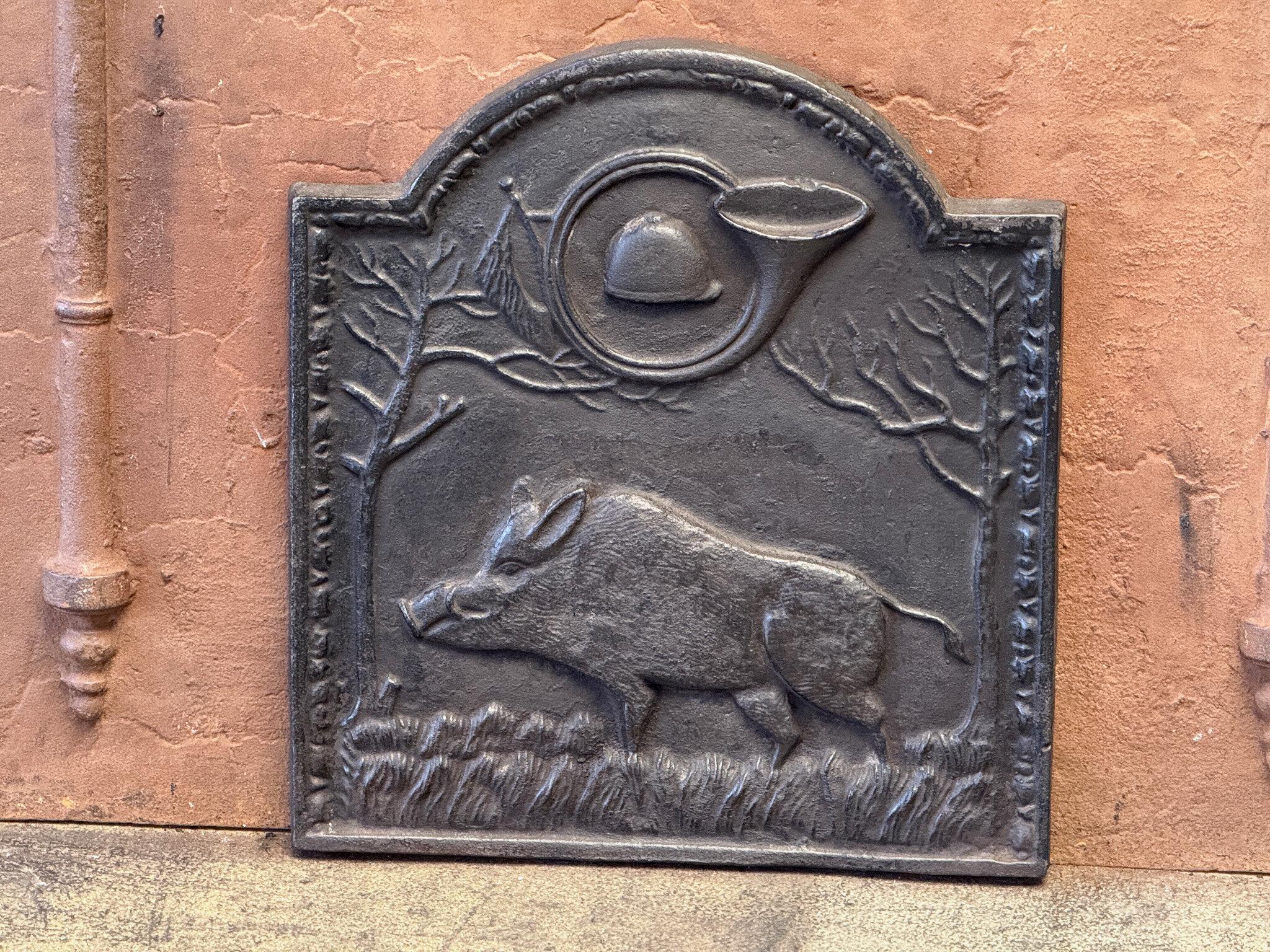 Allegory of the Hunt Fireback, France, Napoleon III Style, 20th Century. 

The fireback is made of cast iron and has a black / pewter patina. The condition is good, no cracks.