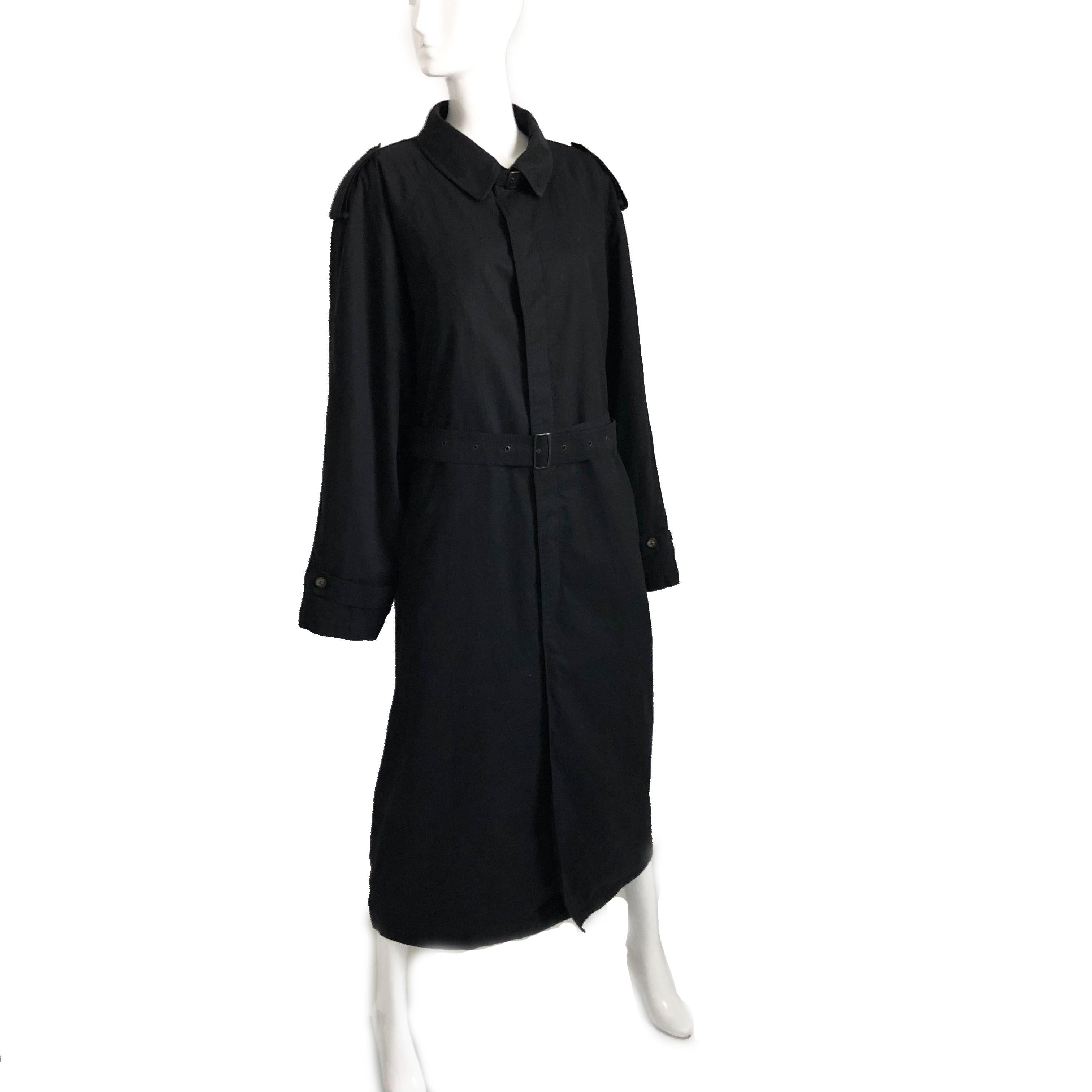 Authentic, preowned ALLEGRI Italy Men's Black Trench Coat w/Belt, IT56. Made from 100% cotton, lined in quilted satin above waist w/hidden pocket, & gray wool below waist. Non-removable lining/dry clean only. Comes w/belt (no loops evident; not