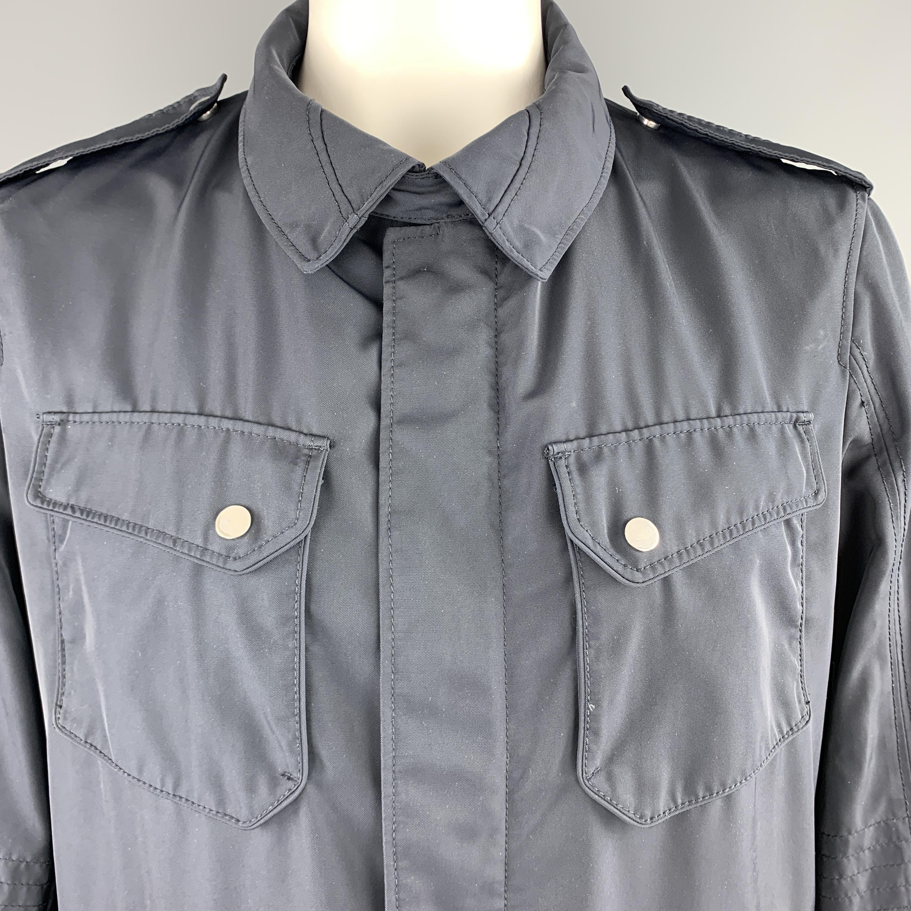 ALLEGRI jacket comes in navy waterproof twill with a pointed snap tab collar, zip closure with snap pocket, and patch flap pockets. Wear throughout. As-is. 

Good Pre-Owned Condition.
Marked: XL

Measurements:

Shoulder: 18 in.
Chest: 46 in.
Sleeve:
