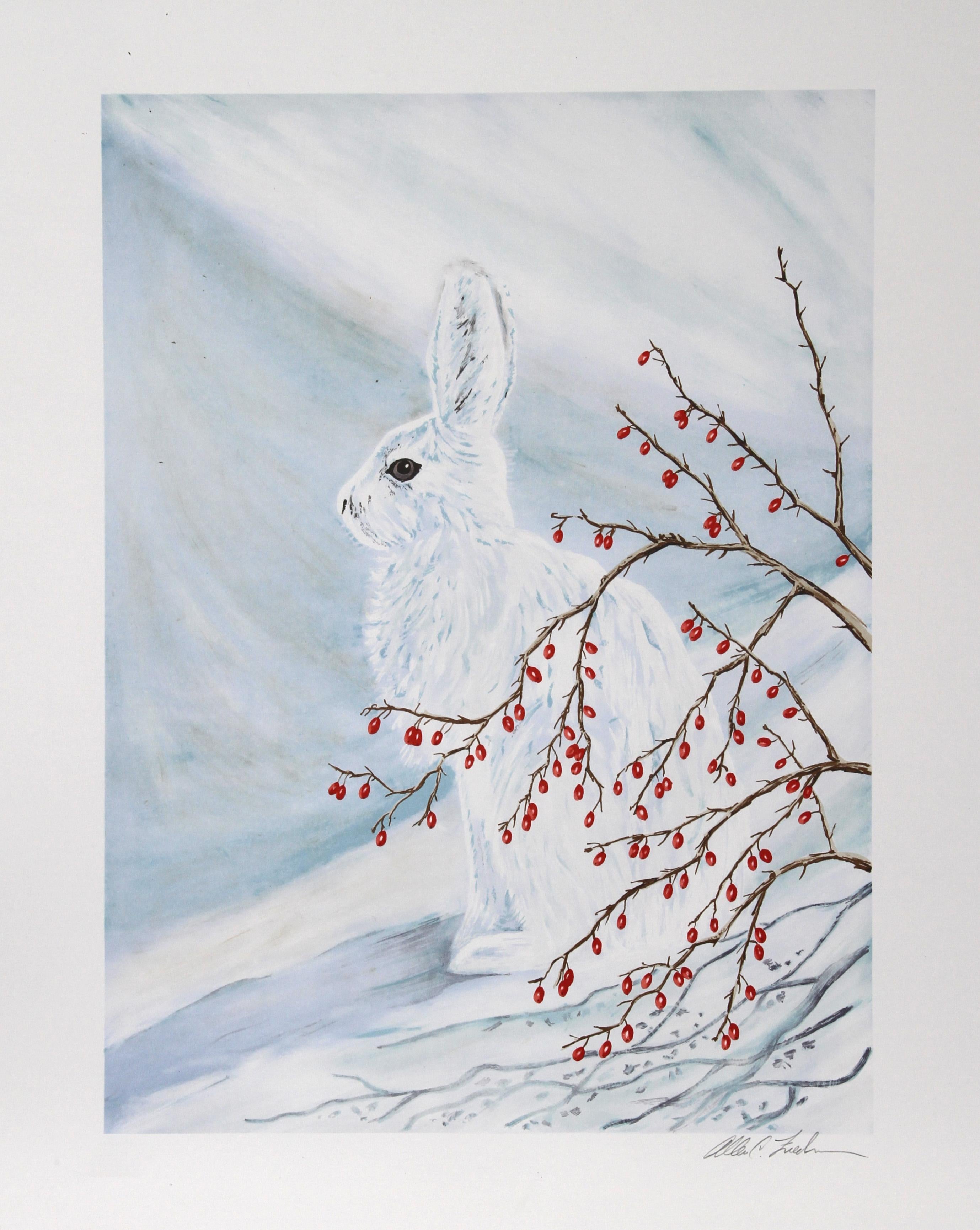 Partially obscured by a bush of winter berries that has lost its leaves, a small snow rabbit sits with its ears up and its body turned to the side. Brown eyes outlined in black, the rabbit’s face is the only part of its body that does not camouflage