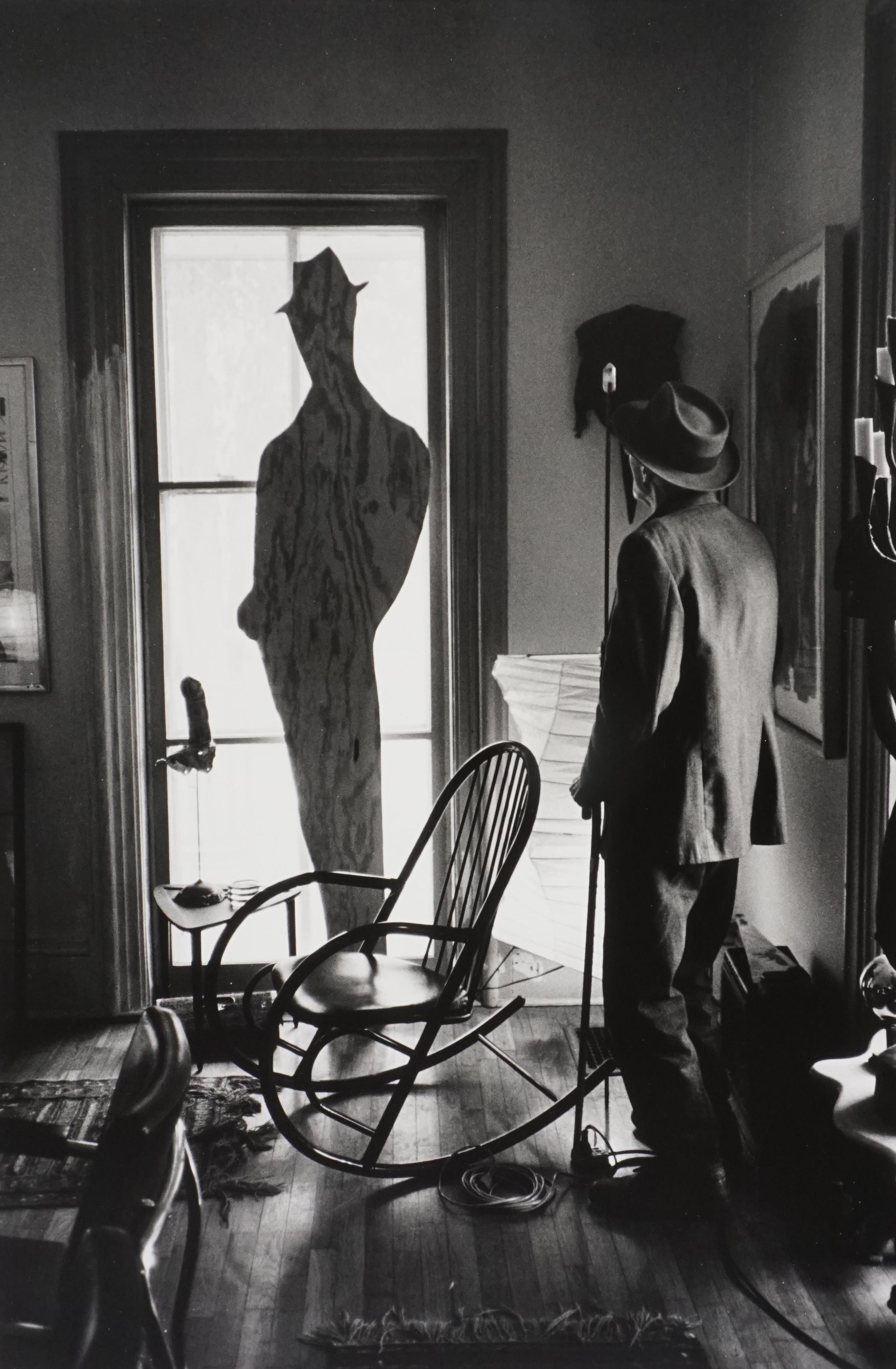 Allen Ginsberg Black and White Photograph - W. Burroughs Looking at Cutouts, 1995