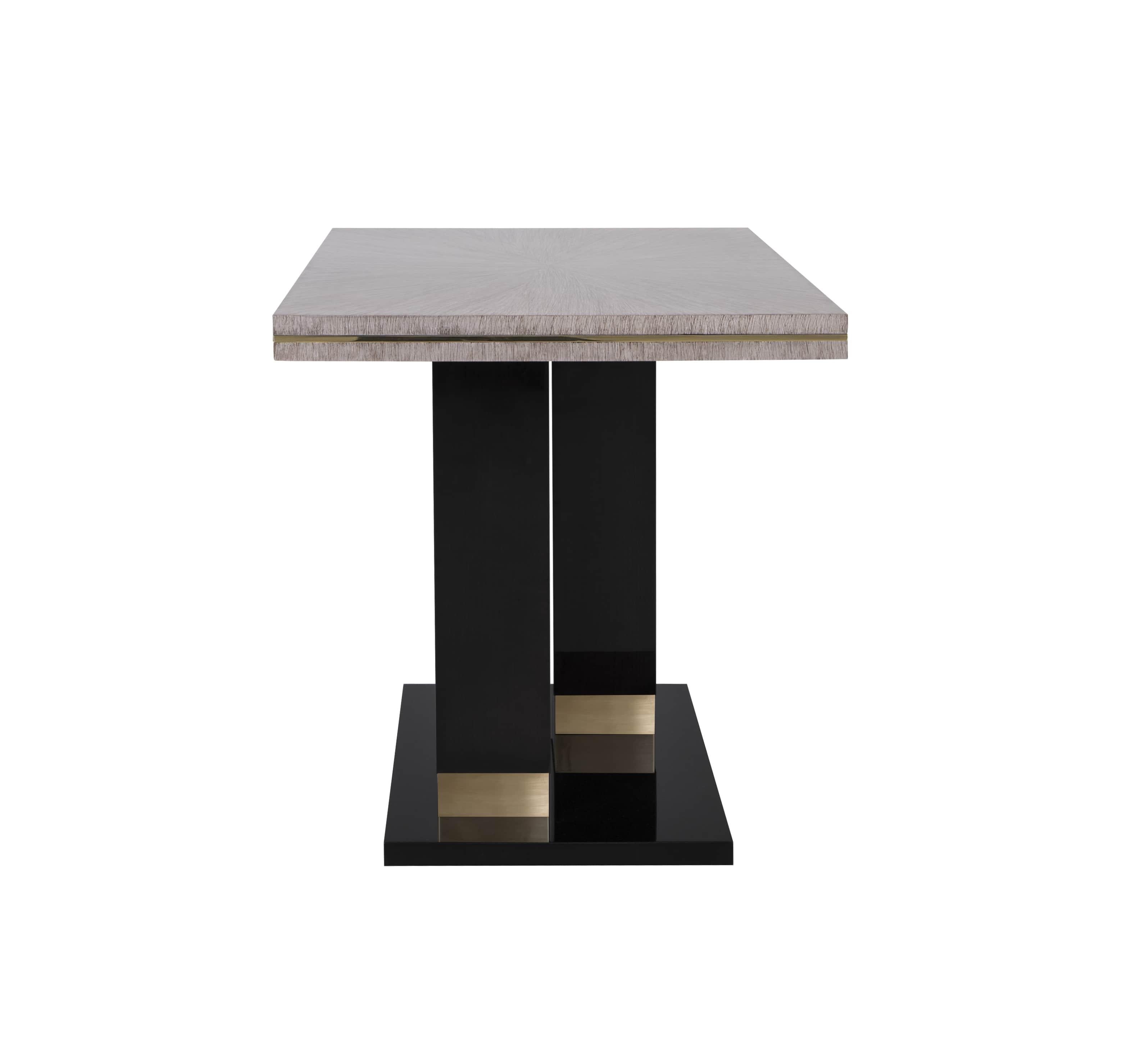 A study in balance and material contrast, this side table combines the warmth of oak with the subtle elegance of brushed brass. Its design is defined by two bold, linear legs in a Linear Black finish, supporting a square top in Linear Natural oak