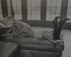 Woman with lace knickers and black boots