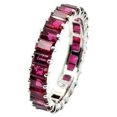 Alliance Ring with Rubies in 18 karat White Gold by Gübelin