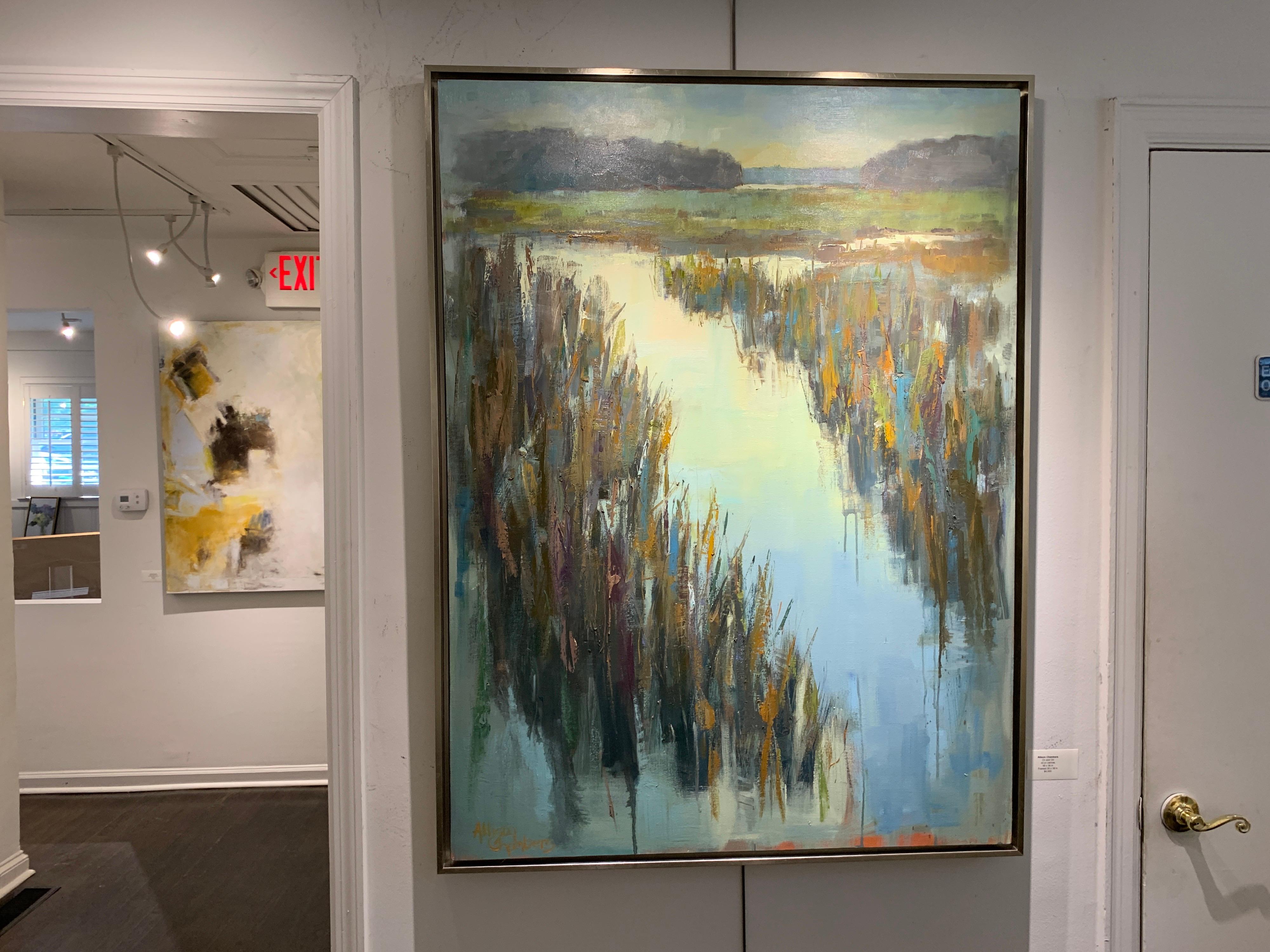 'On and On' is a large framed Impressionist oil on canvas painting of vertical format created by American artist Allison Chambers in 2021. Featuring a palette made of green, blue, cream and brown tones among others, this painting depicts a marsh