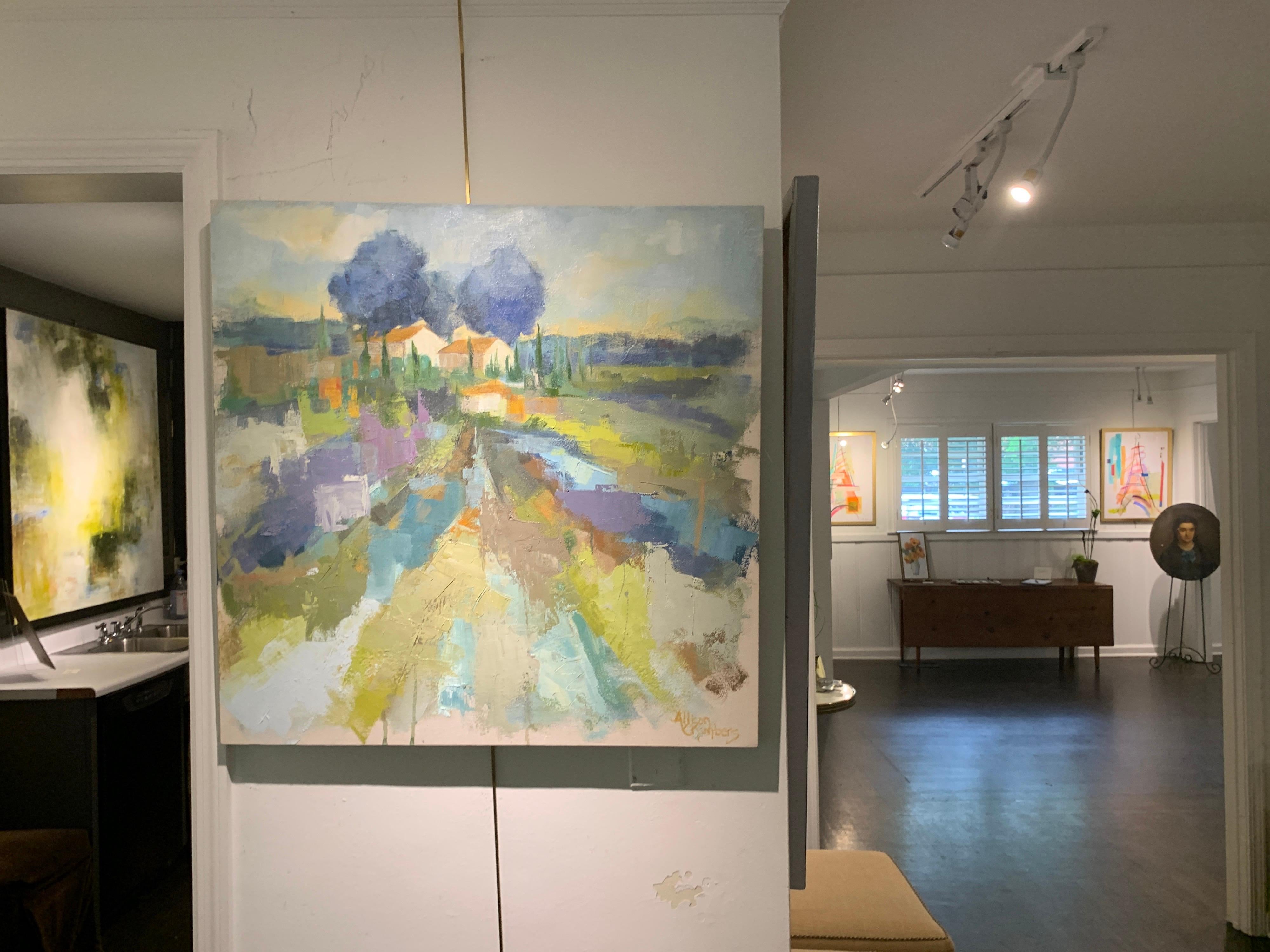 'Out of Nowhere' is an oil on canvas Impressionist landscape painting of square format created by American artist Allison Chambers in 2021. Featuring a palette made of green, grey and beige blue, the painting depicts an exquisite south of France