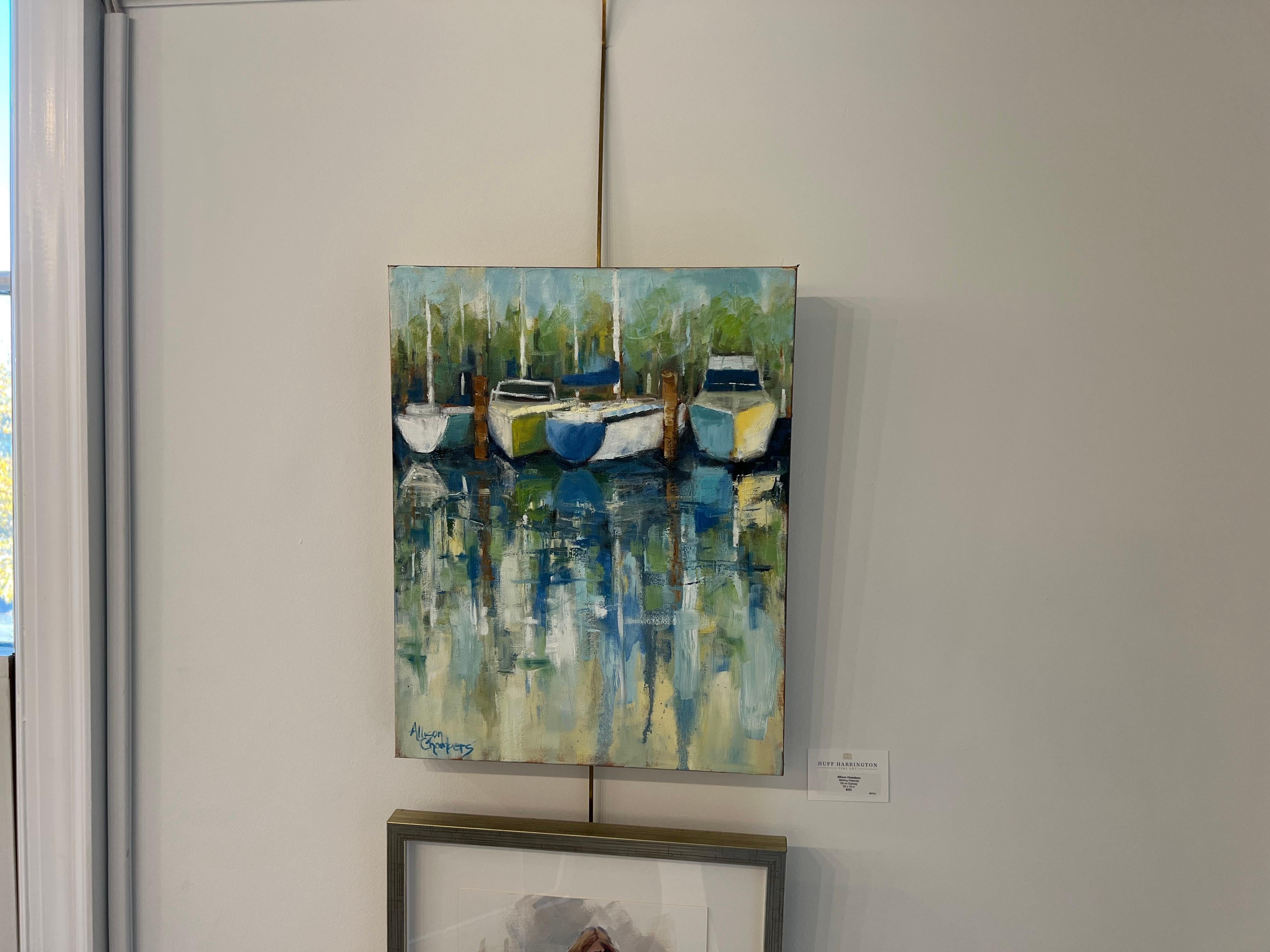 'Waiting Patiently' is a petite oil on canvas painting of vertical format created by American artist Allison Chambers in 2021. Featuring a palette made of green, blue, cream and brown tones among others, this painting depicts a harbor with sailboats