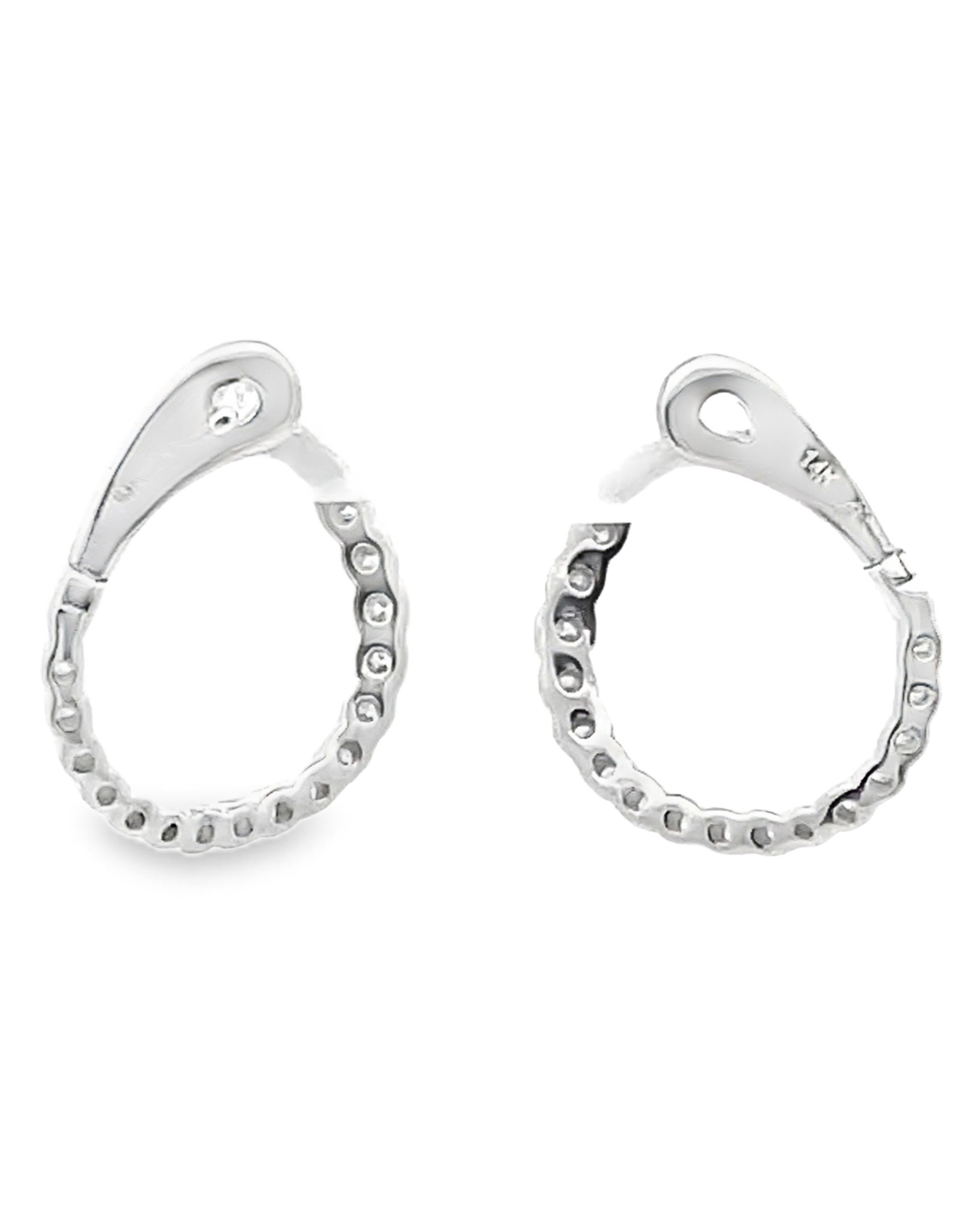 Allison Kaufman 14K white gold hoop earrings with diamonds weighing 0.50 carat total.  

- Diamonds are G color, SI3 clarity 