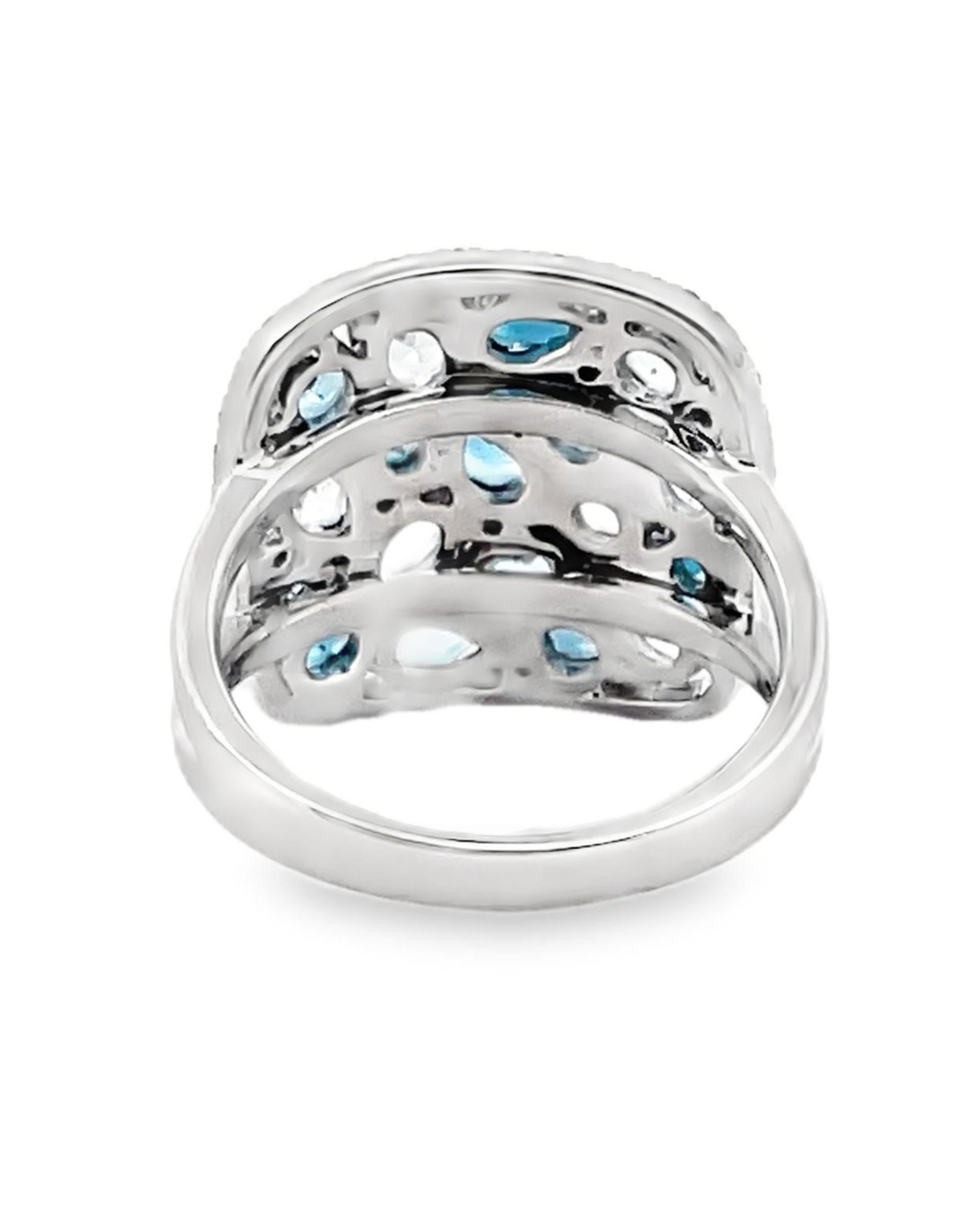 Allison Kaufman 14K white gold fashion ring with blue topaz weighing 3.67 carats total and diamonds weighing 0.27 carats total.

- Diamonds are G color, SI1/2 clarity.