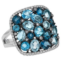 Anillo de moda Allison Kaufman de oro blanco de 14 quilates con topacio azul y diamantes