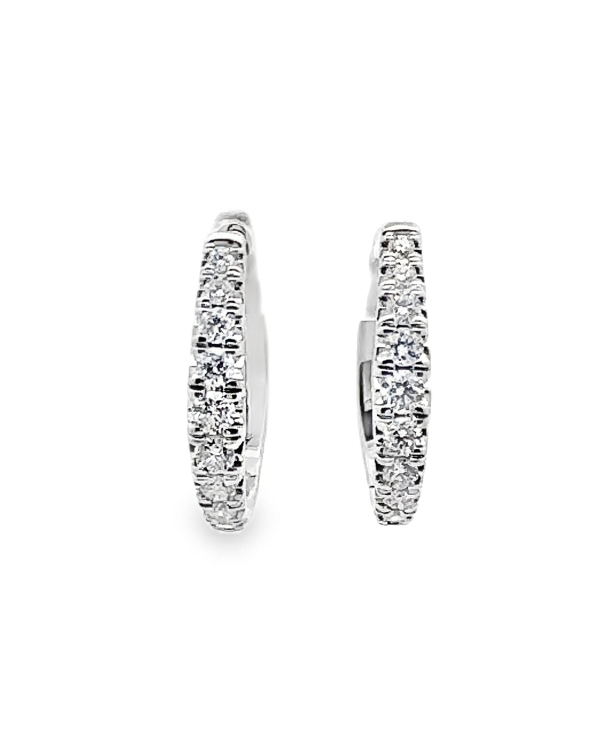 Allison Kaufman 14K white gold small hoop earrings with round brilliant-cut diamonds weighing 0.50 carats total.

- Diamonds are G color, SI2 clarity
- European closure.