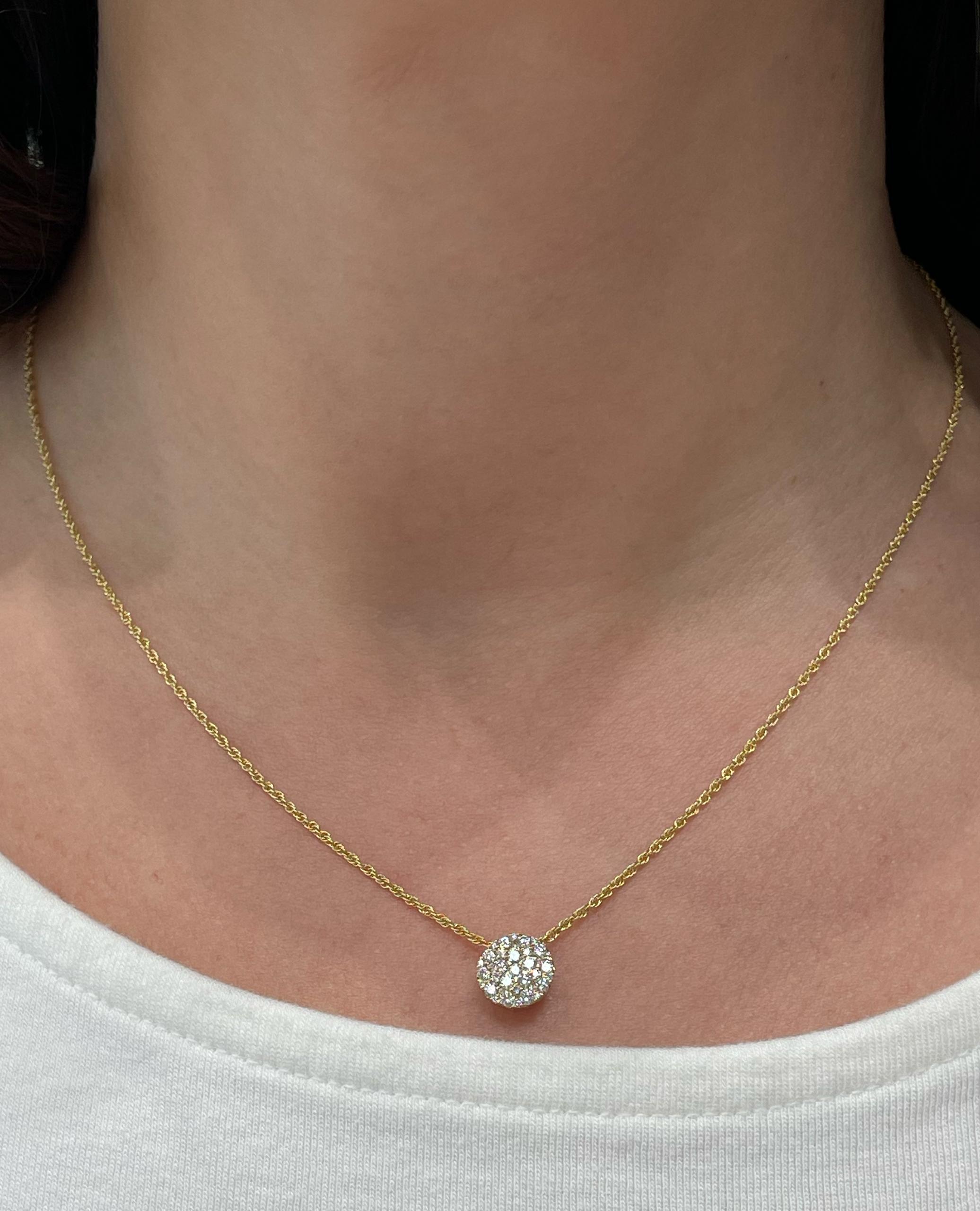Allison Kaufman 14K yellow gold round pendant necklace with pave set diamonds weighing 0.50 carats total.  

- G color, SI3 clarity