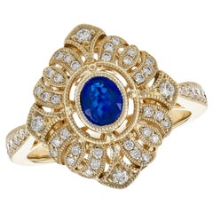 Anillo de moda Allison Kaufman de oro amarillo de 14 quilates con zafiro azul y diamantes
