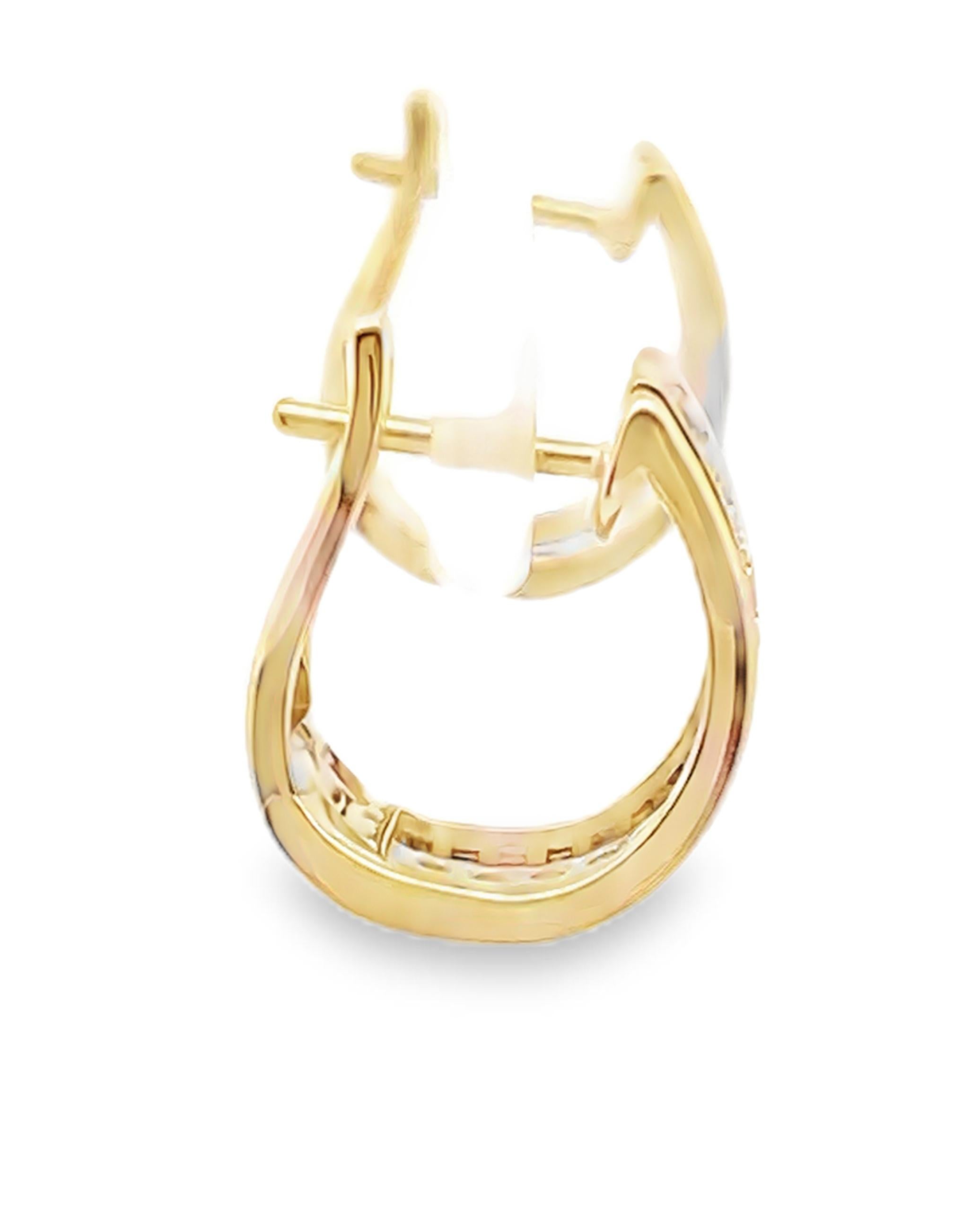 Allison Kaufman 14K yellow gold huggie hoop earrings with row of diamonds weighing 0.28 carat total and textured borders

- Diamonds are G color, SI3 clarity