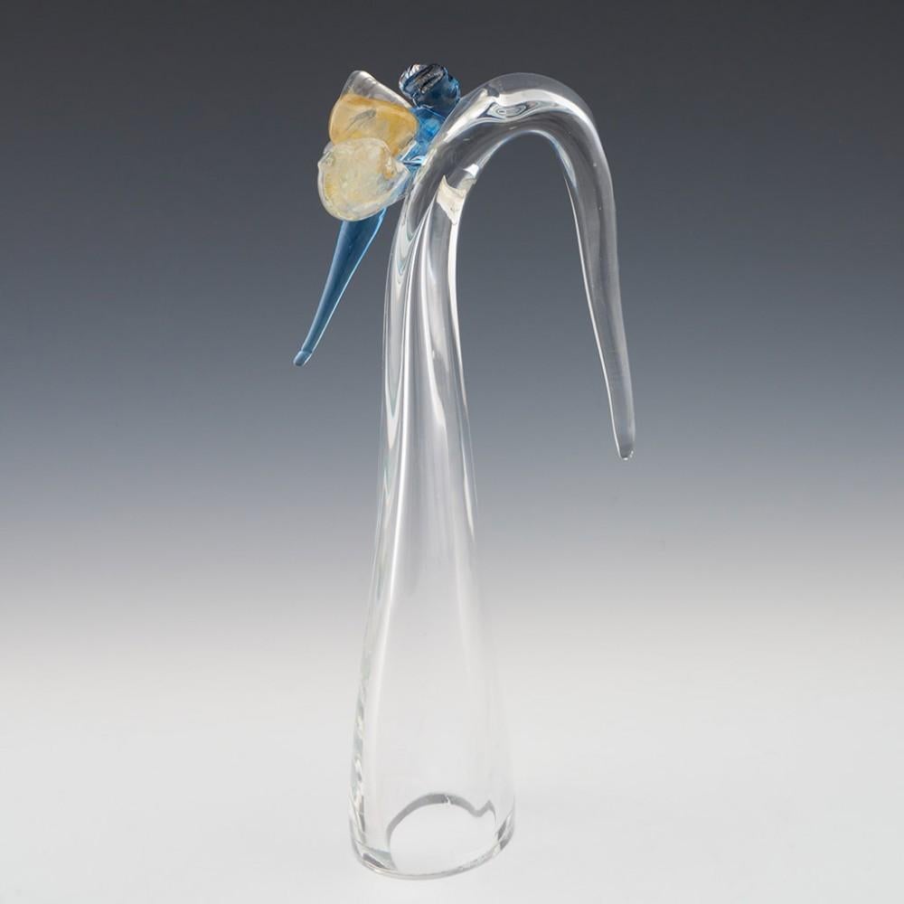 Heading : Allister Malcolm 'Poised for Flight' dragonfly
Date : 2023
Origin : Stourbridge, England
Bowl Features : A blue glass dragonfly with iridescent eyes and clear wings which have gold and silver foil inclusions.
Marks : Signed to base.
Type :