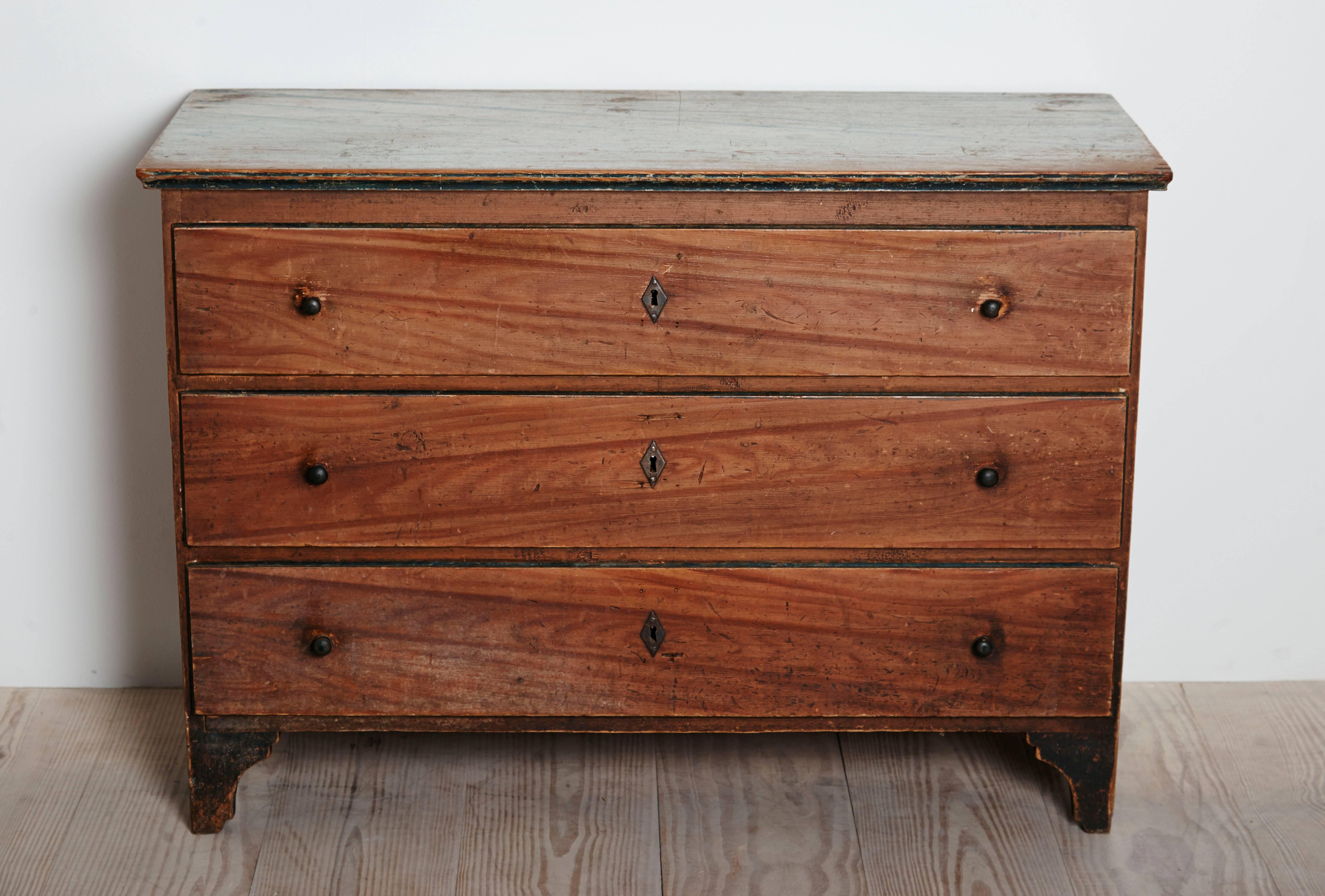 Swedish Allmoge commode, origin: Sweden, signed and dated 1842, with all original faux grain painted finish and faux marble top, and hardware.