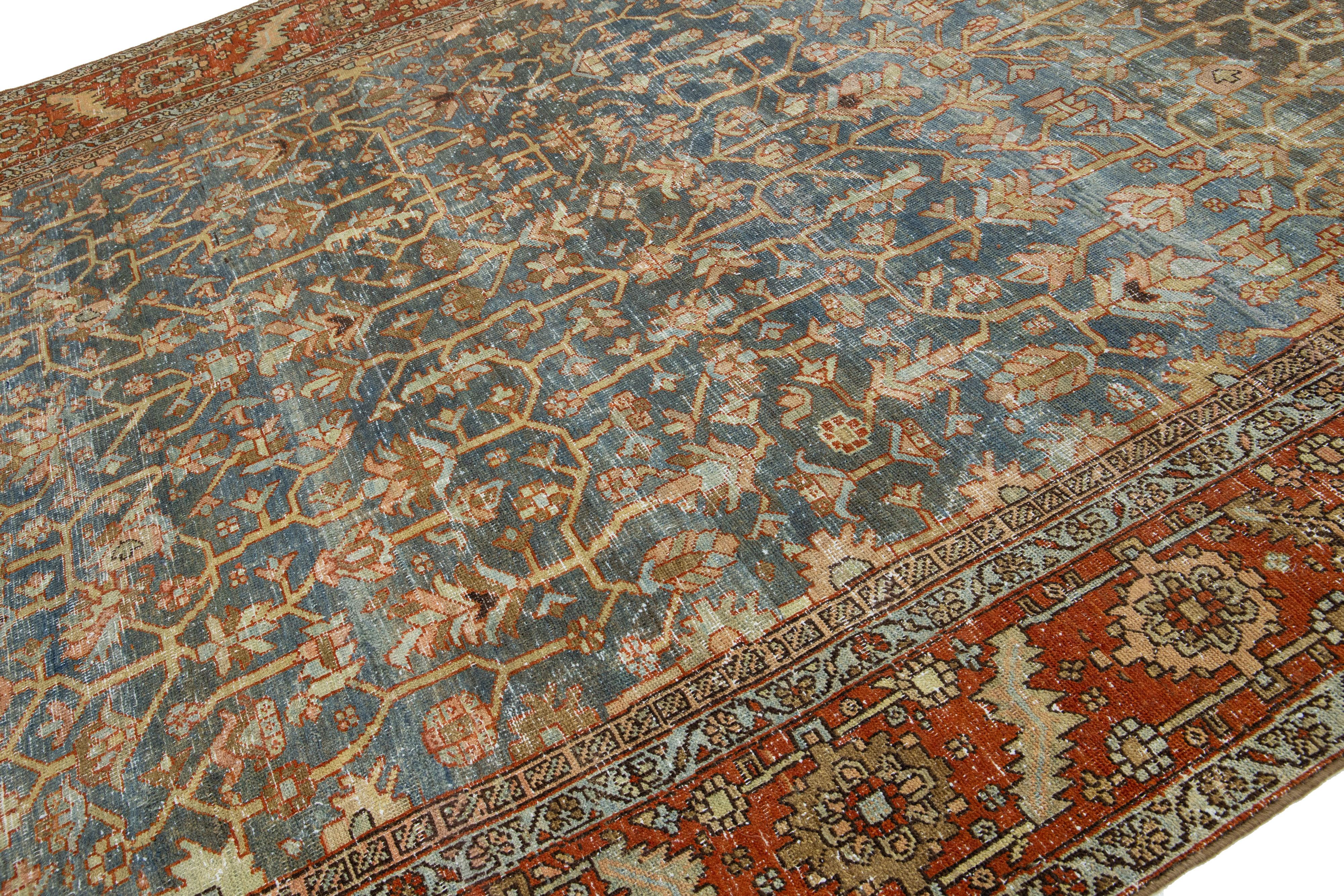 Heriz Serapi Allover Antique Persian Heriz Wool Rug Featuring In Blue From The 1910s For Sale