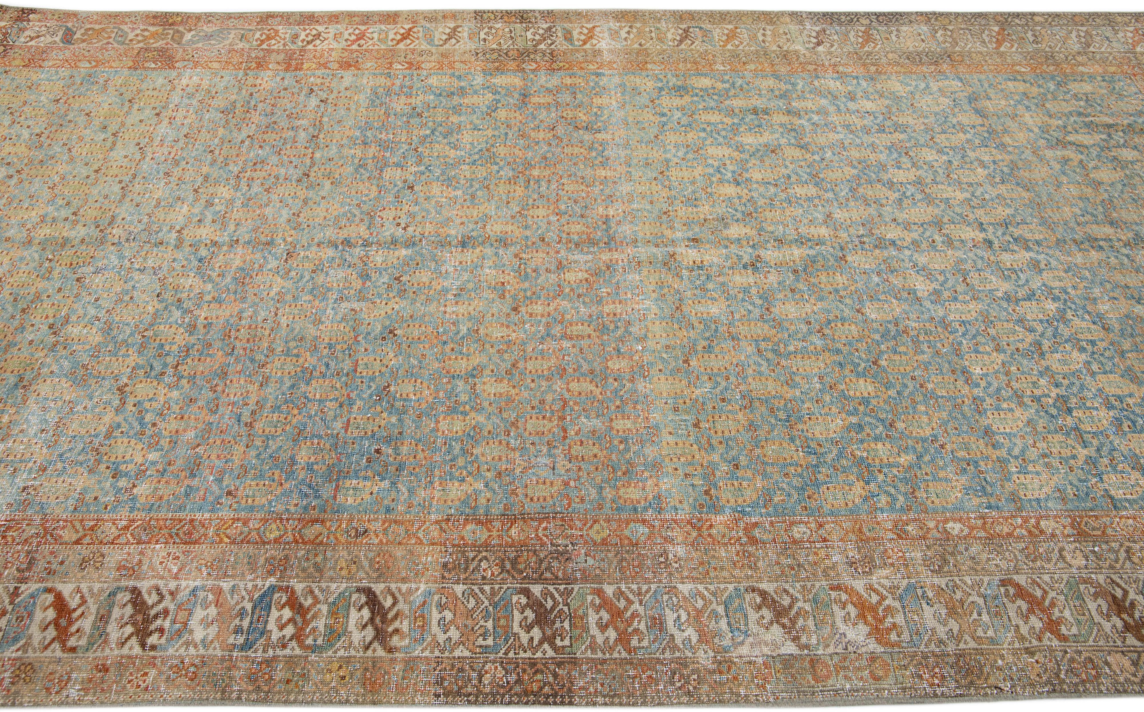 20th Century Allover Antique Persian Malayer Wool Rug with Bue & Rust Color Field For Sale