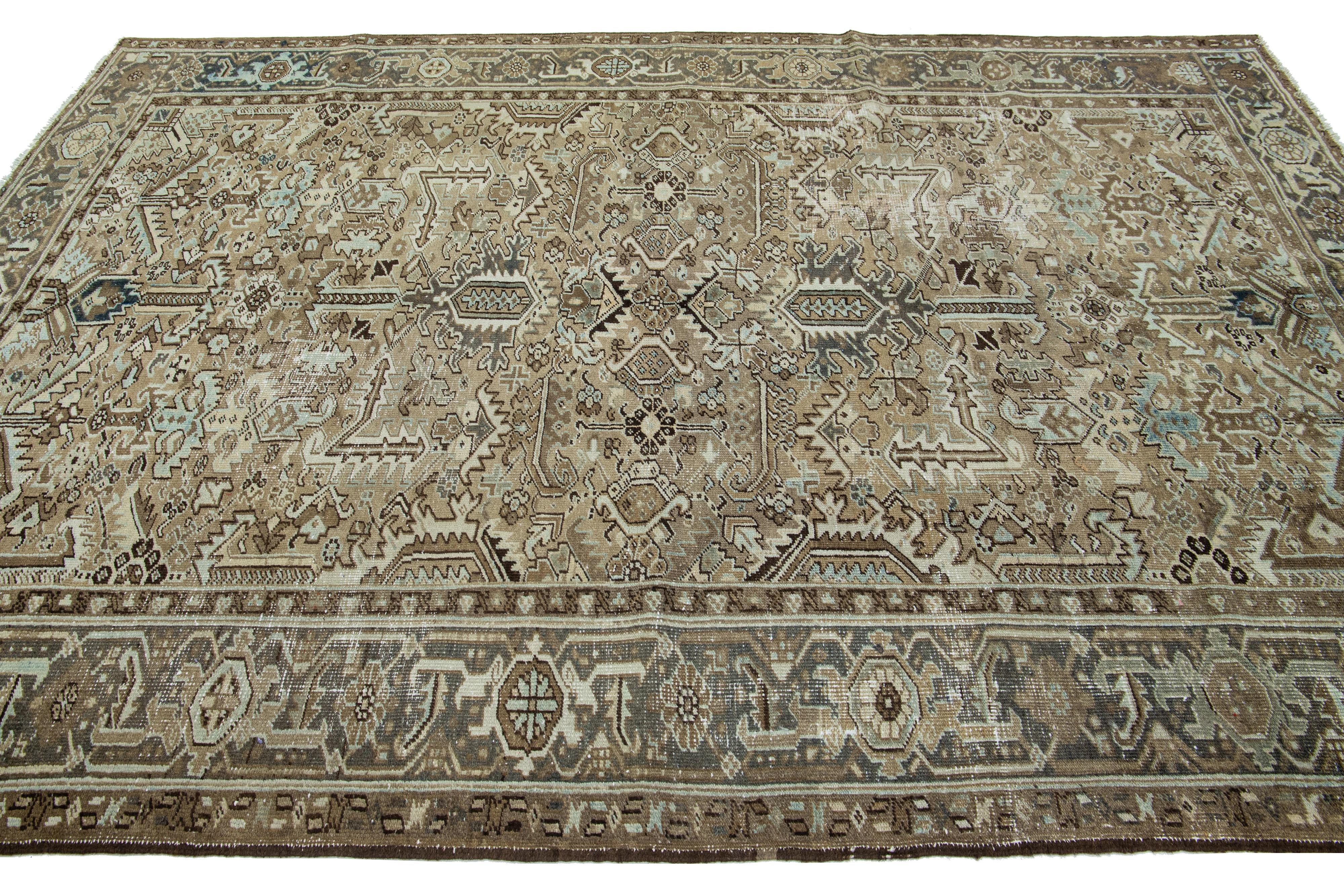 Hand-Knotted Allover Antique Wool Rug Persian Heriz In Brown Color From The 1920s For Sale