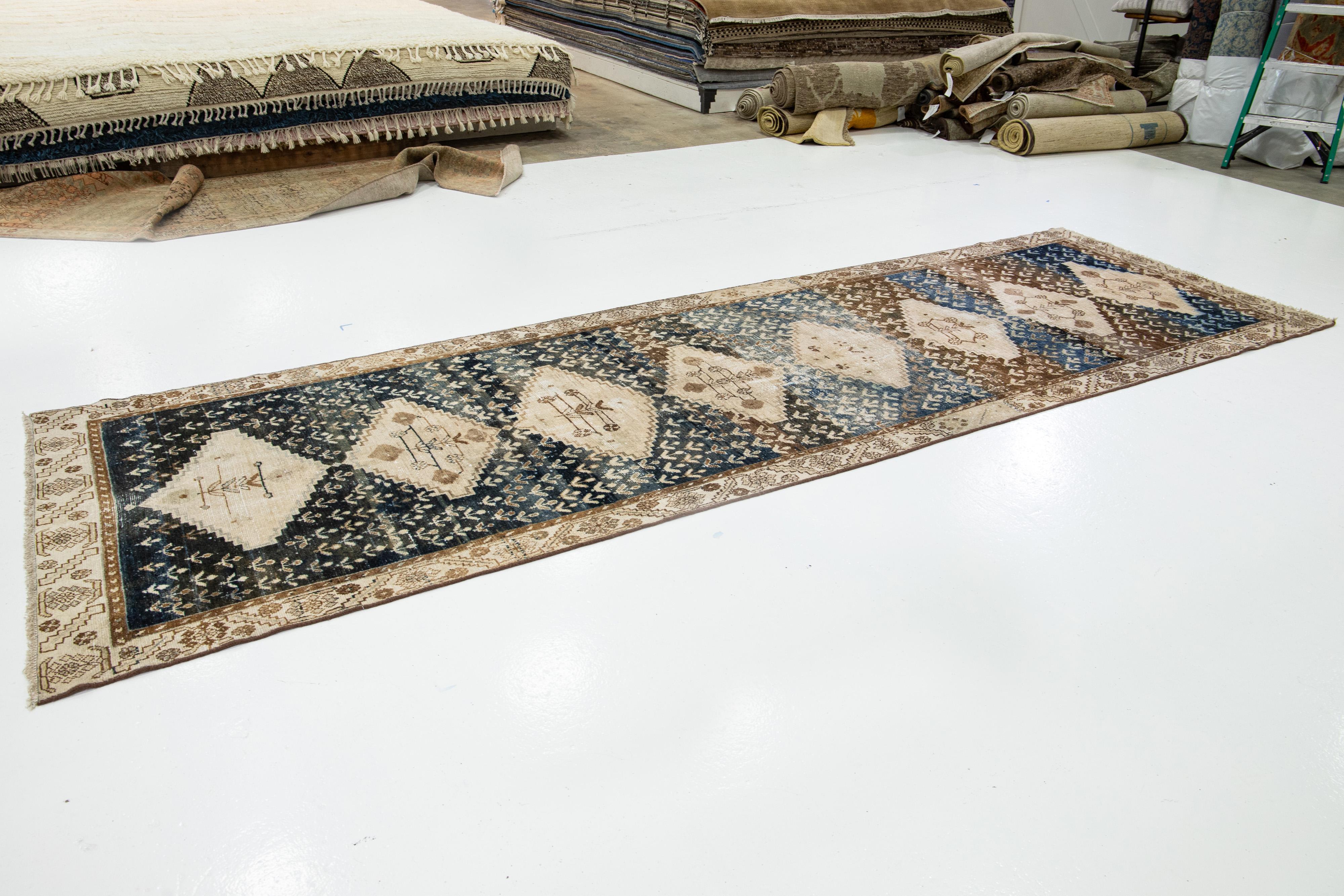 Allover Designed Antique Persian Malayer Wool Runner In Blue and Brown In Distressed Condition For Sale In Norwalk, CT